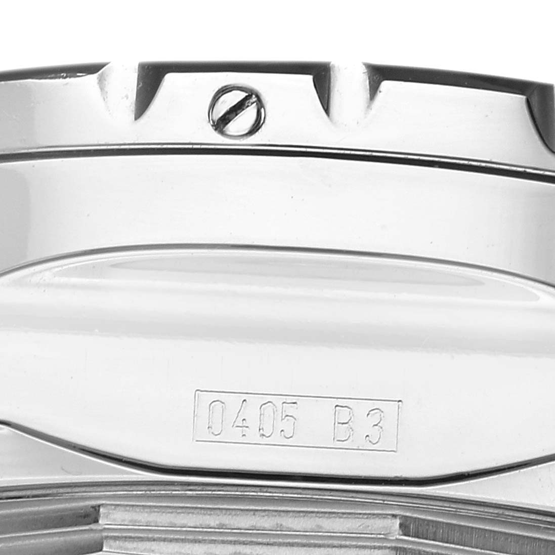 The image shows a close-up of the side profile of a Breitling Bentley A13362 Men's Stainless Steel Green Dial A13362 Men's Stainless Steel Green Dial watch, highlighting the bezel and part of the case with serial number engraving.