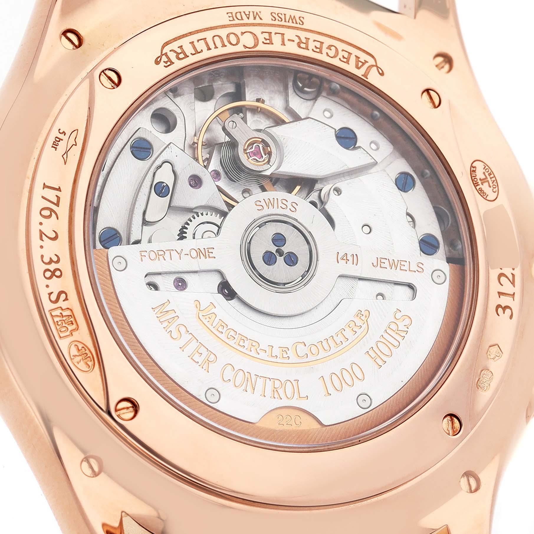 The image shows the back of a Jaeger-LeCoultre Master model, revealing its intricate movement and engravings.