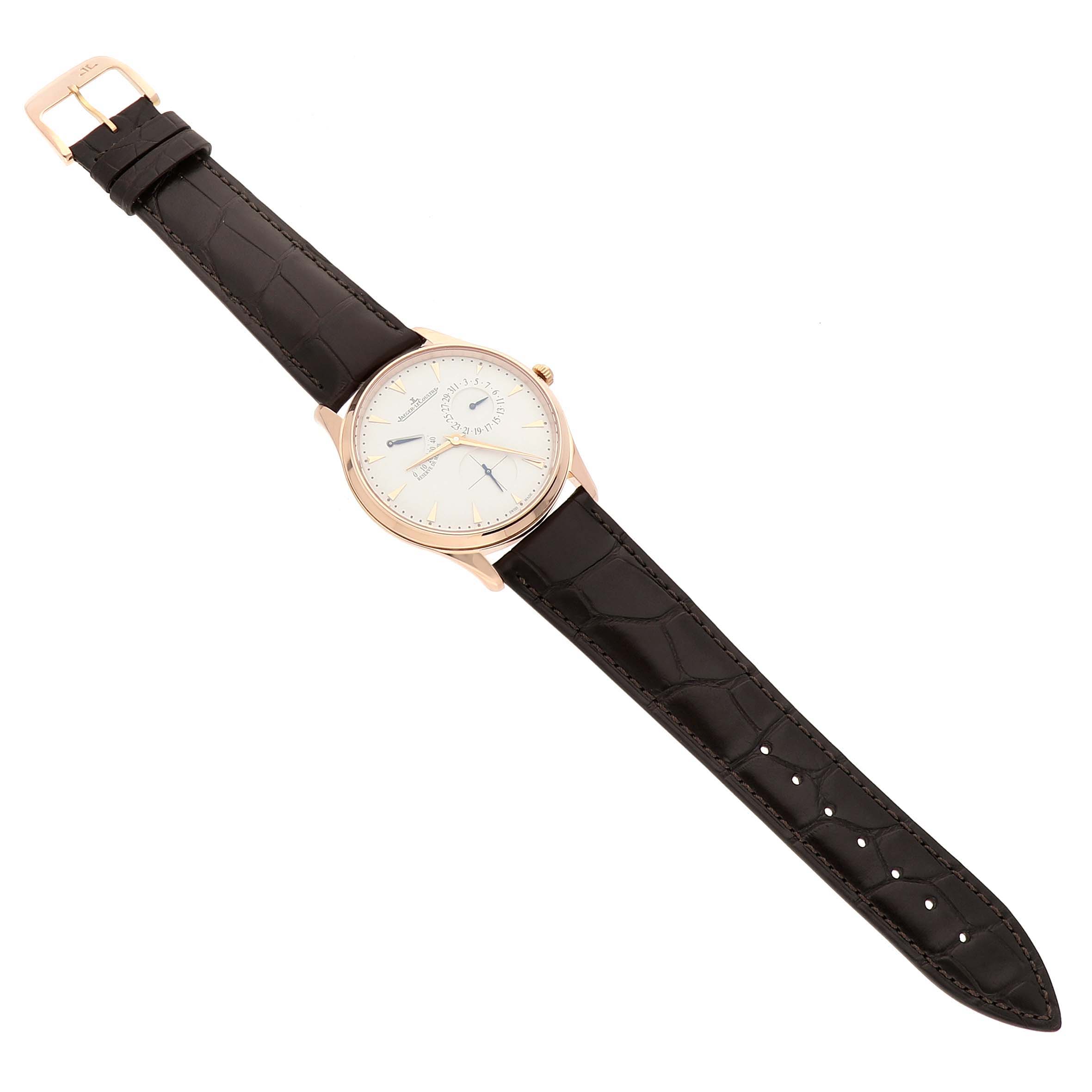 The Jaeger LeCoultre Master 176.2.38.S / Q3123294 Men's Rose Gold Beige Dial watch is shown from an angled top-down view, highlighting the face, strap, and clasp.