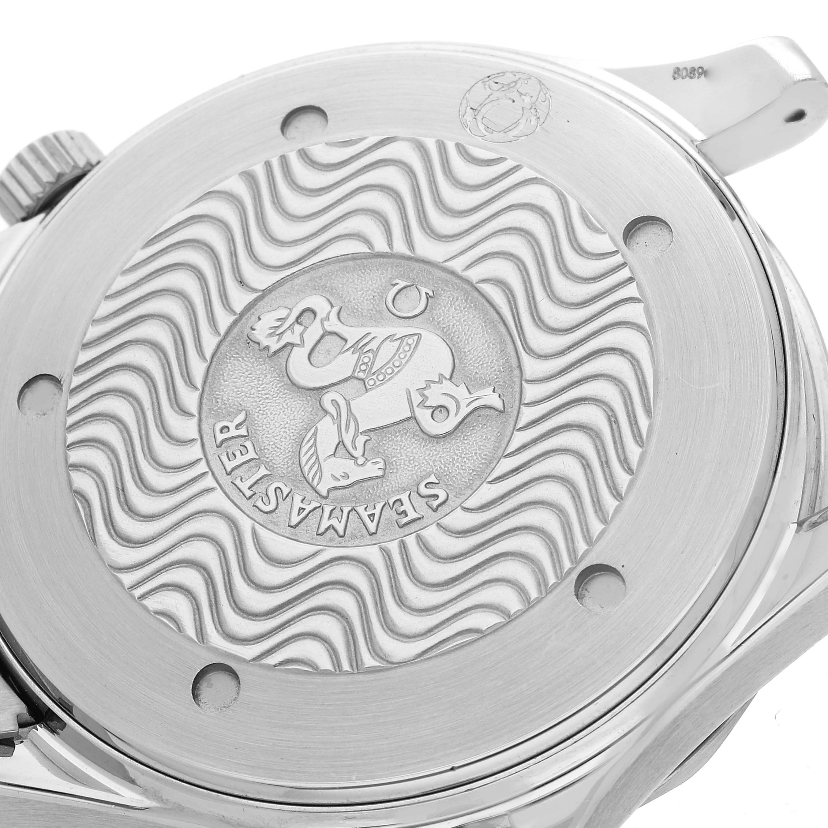 The image shows the case back of an Omega Seamaster 2531.80.00 Men
s Stainless Steel Blue Dial 2531.80.00 Men
s Stainless Steel Blue Dial watch with its engraved wave pattern and emblem.