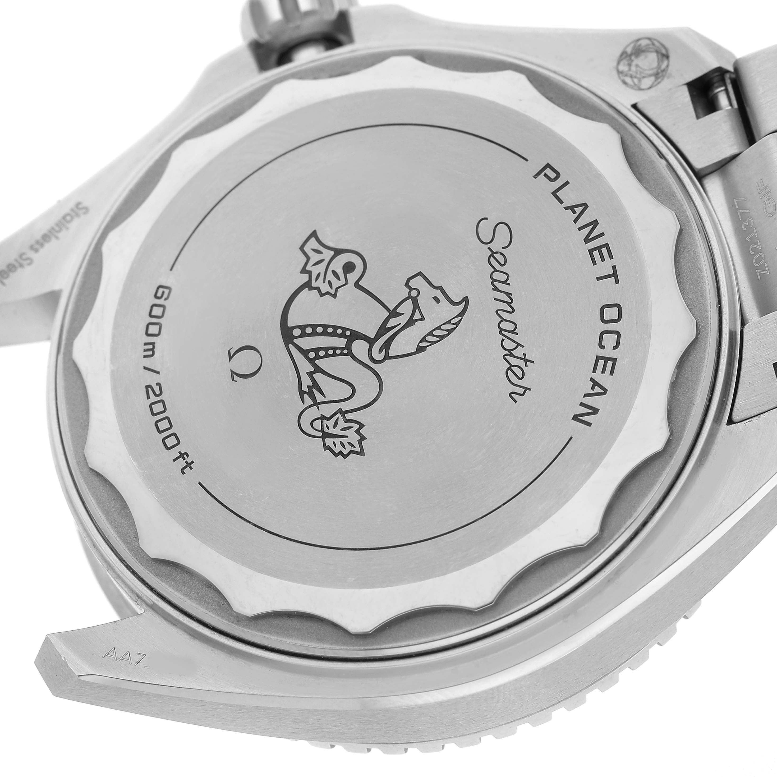 The image shows the case back of an Omega Seamaster 217.30.42.21.01.001 Men's Stainless Steel Black Dial Planet Ocean, highlighting engraved details and water resistance markings.