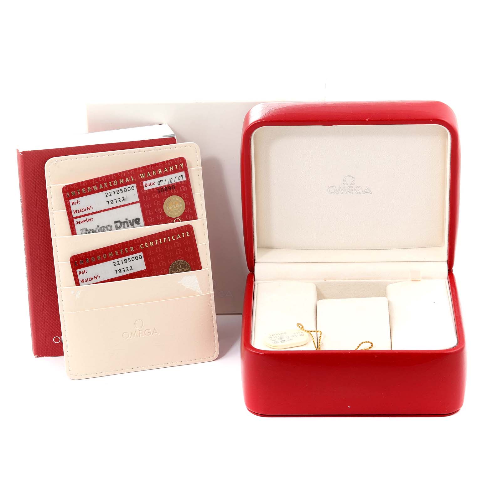 The image shows the Omega Planet Ocean 2218.50.00 Men
s Stainless Steel Black Dial 2218.50.00 Men
s Stainless Steel Black Dial watch
s red storage box and holder, along with warranty and chronometer certificates.