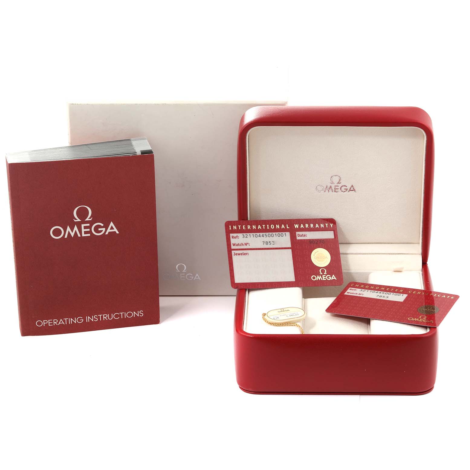 The image shows an Omega Speedmaster 321.10.44.50.01.001 Men
s Stainless Steel Black Dial 321.10.44.50.01.001 Men
s Stainless Steel Black Dial watch box, warranty cards, and an operating instructions booklet from a frontal angle.