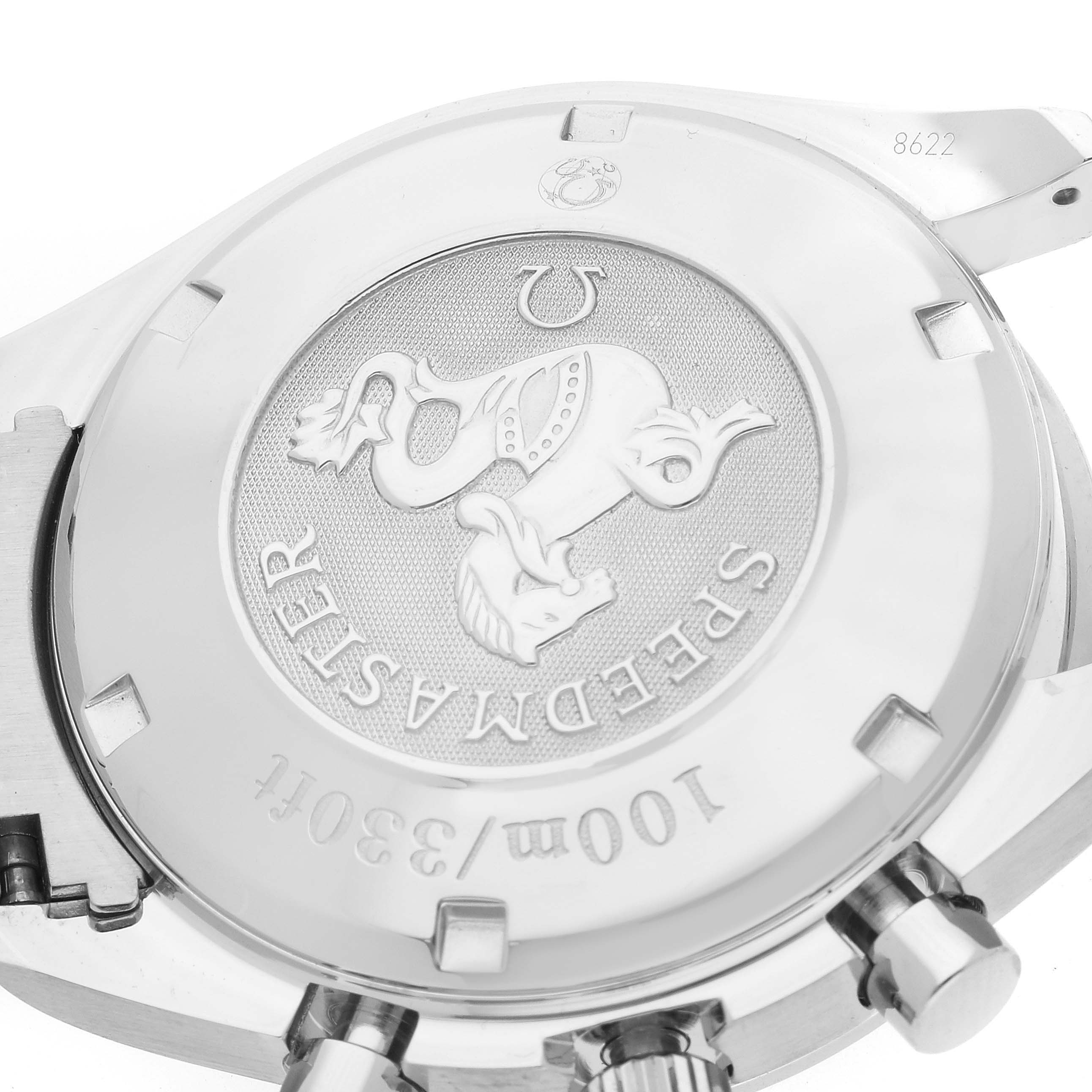 The image shows the back case of an Omega Speedmaster 3210.50.00 Men
s Stainless Steel Black Dial 3210.50.00 Men
s Stainless Steel Black Dial watch with the model engraving and some side buttons partially visible.