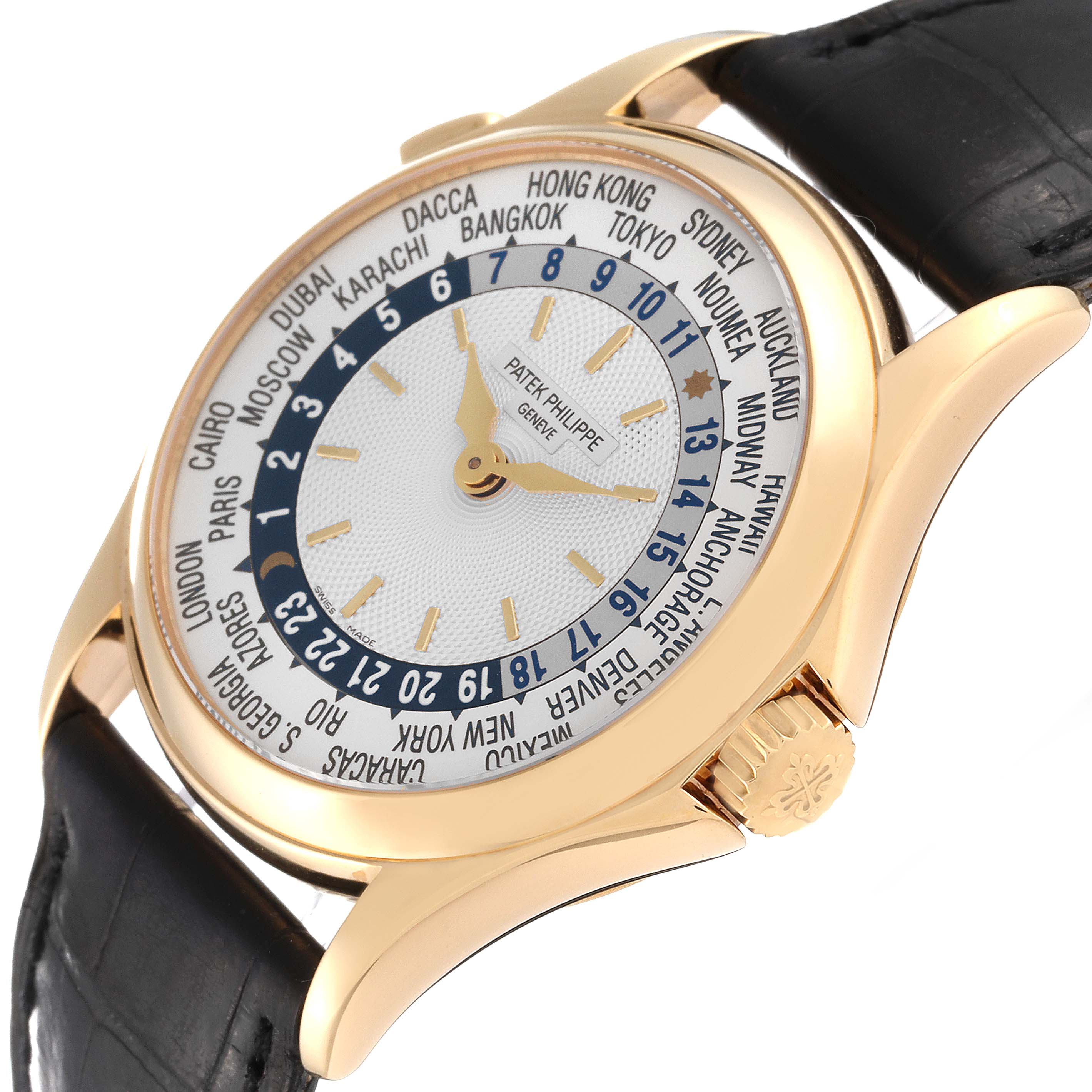 The image shows the Patek Philippe Complications 5110J-001 Men's Yellow Gold Silver Dial 5110J-001 Men's Yellow Gold Silver Dial watch at an angle revealing the face, crown, and part of the leather strap.