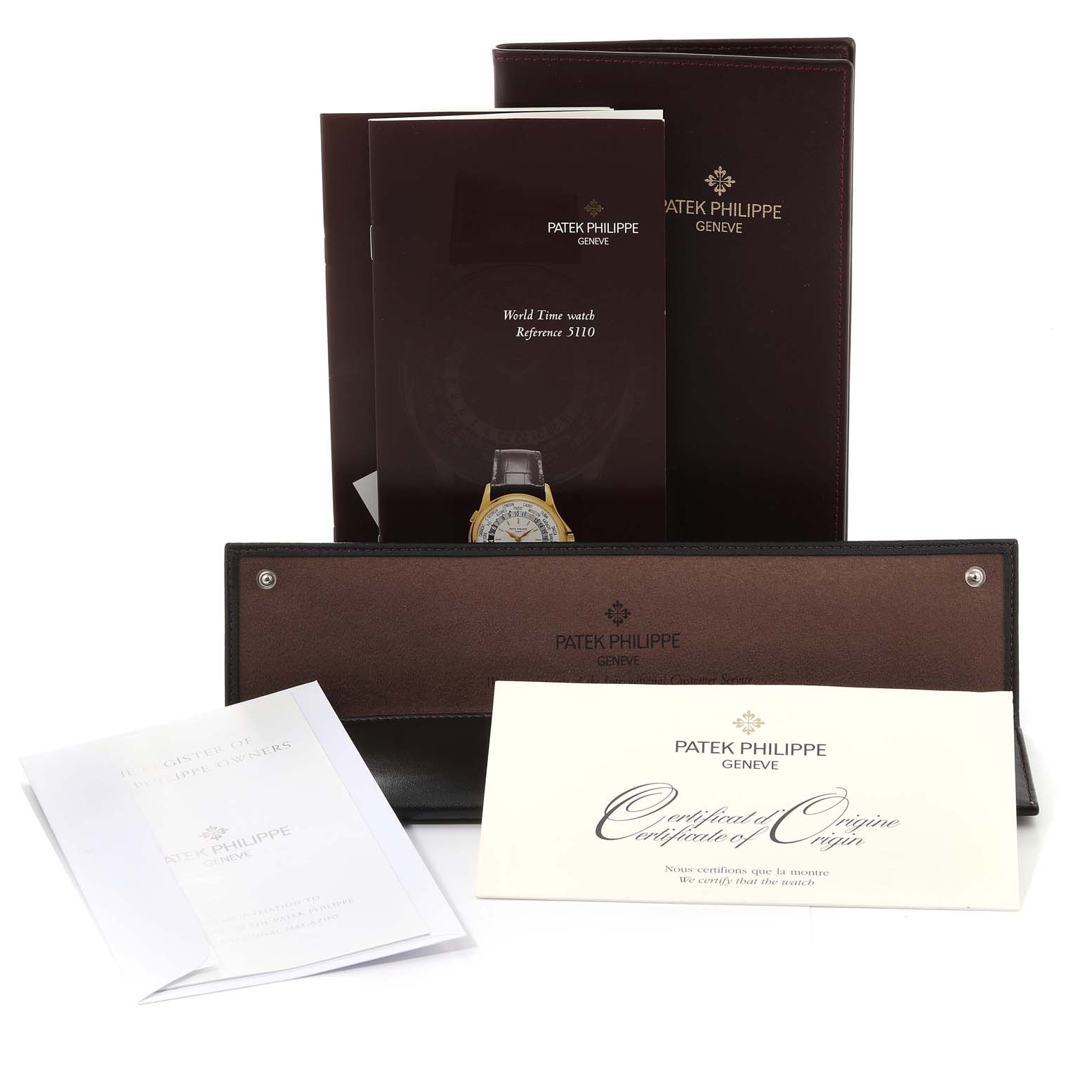The image shows the documentation and accessories, including the certificate, for a Patek Philippe Complications 5110J-001 Men's Yellow Gold Silver Dial 5110J-001 Men's Yellow Gold Silver Dial watch model.