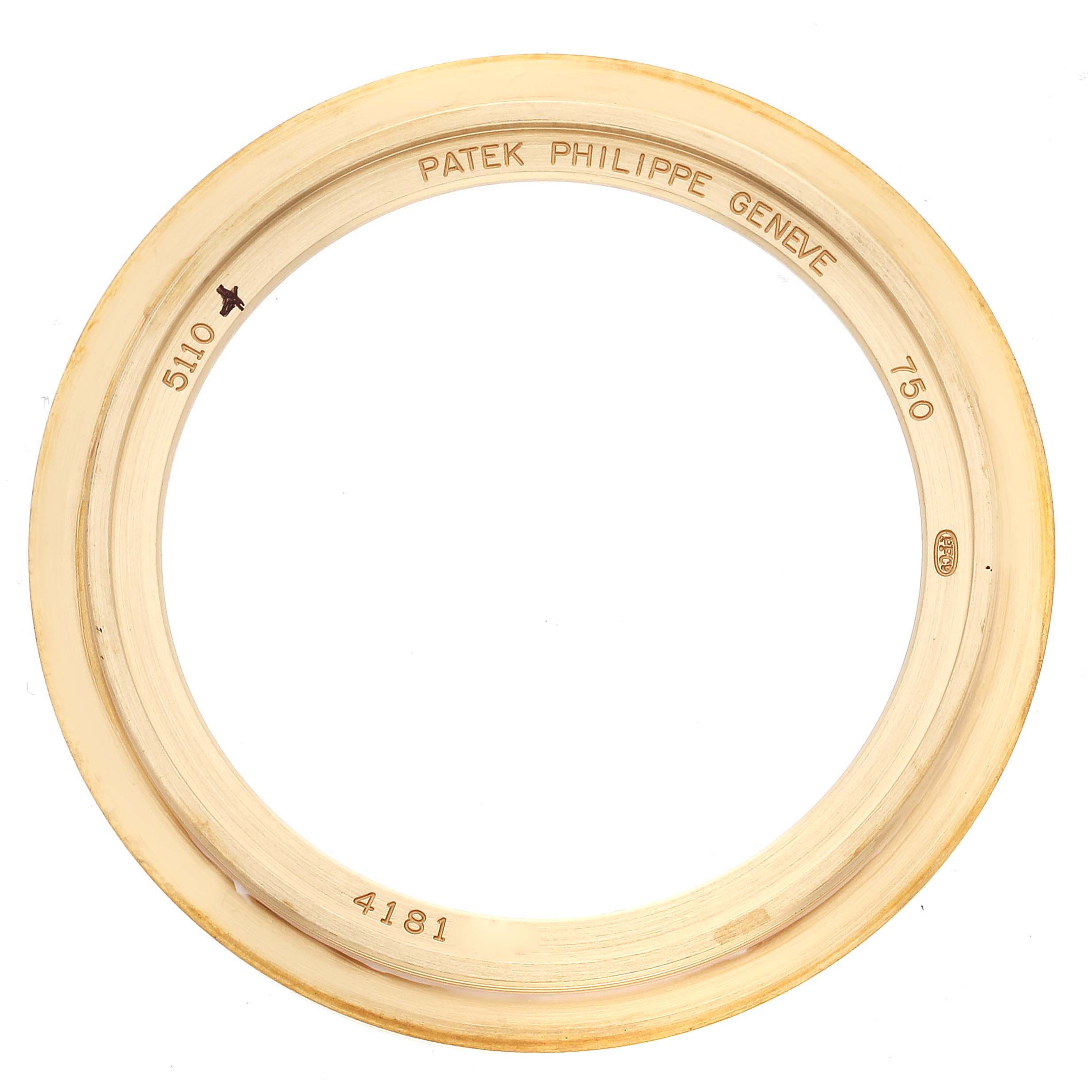 The image shows a gold bezel for a Patek Philippe Complications 5110J-001 Men's Yellow Gold Silver Dial 5110J-001 Men's Yellow Gold Silver Dial model, viewed from above.