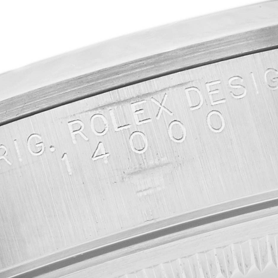 This image shows a close-up of the case back with engravings on a Rolex Air-King 14000 Men's Stainless Steel Black Dial 14000 Men's Stainless Steel Black Dial watch.