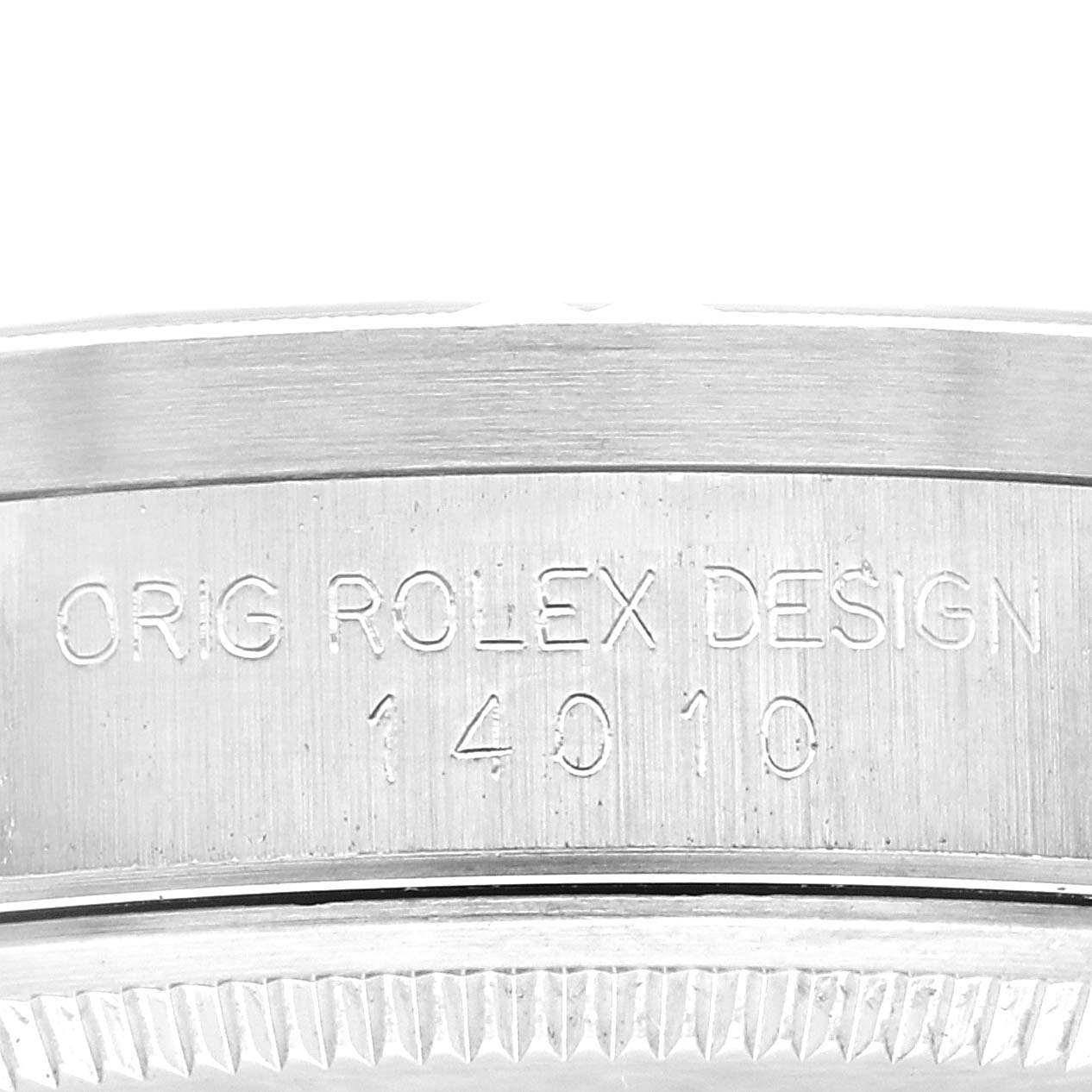 The image shows a close-up view of the engraved side of the case of a Rolex Air-King 14010 Men's Stainless Steel Blue Dial 14010 Men's Stainless Steel Blue Dial, displaying the words "ORIG ROLEX DESIGN 14010."