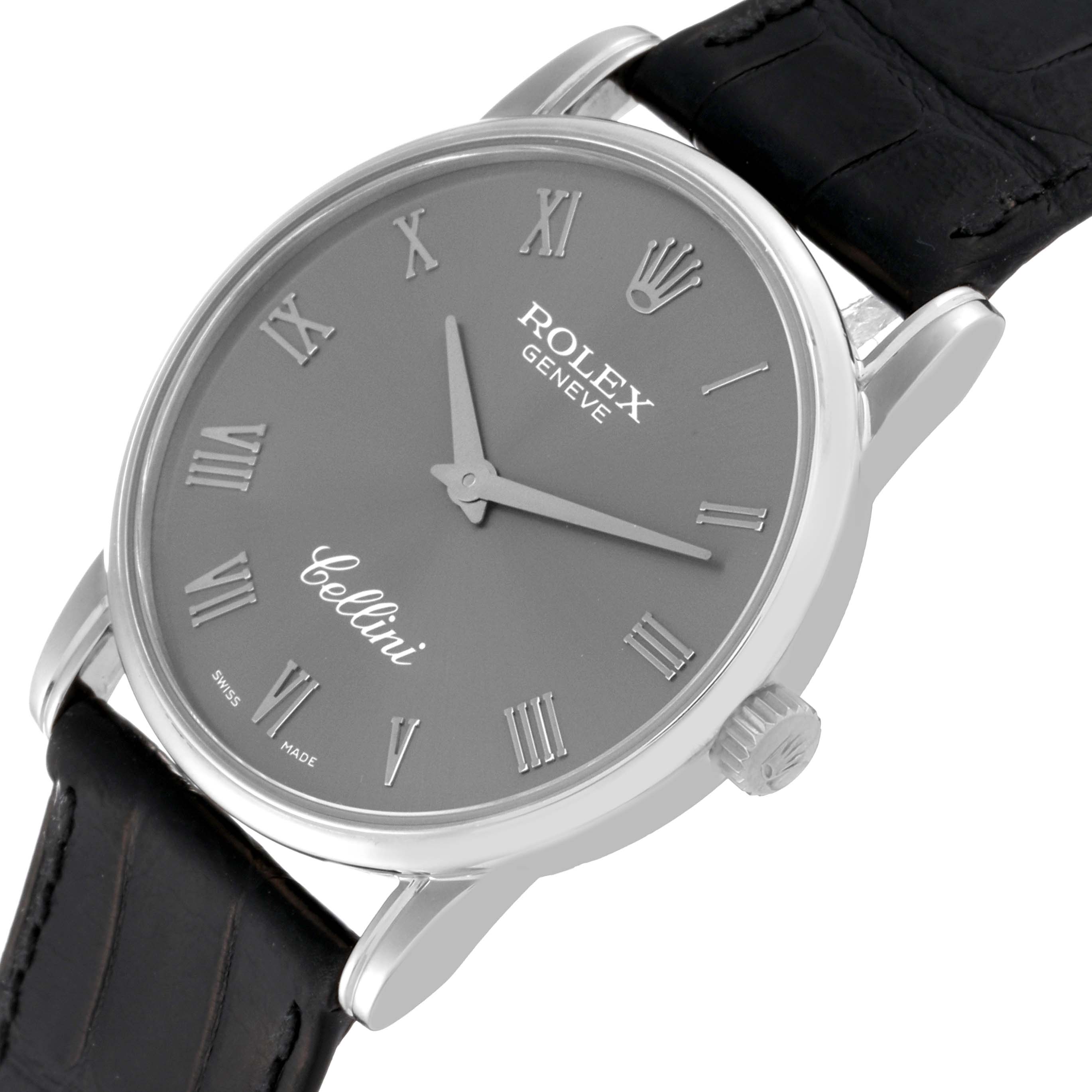 The image shows a Rolex Cellini 5116/9 Men's White Gold Grey Dial 5116/9 Men's White Gold Grey Dial watch at a slight angle, highlighting its face, Roman numerals, case, and part of the black strap.
