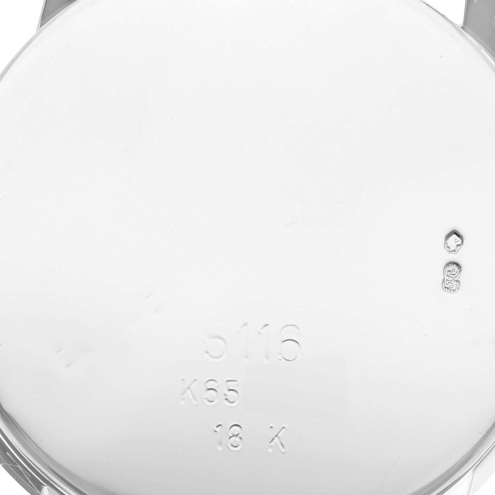 The image shows the back case of a Rolex Cellini 5116/9 Men's White Gold Grey Dial 5116/9 Men's White Gold Grey Dial watch, displaying its engravings from a straight-on angle.