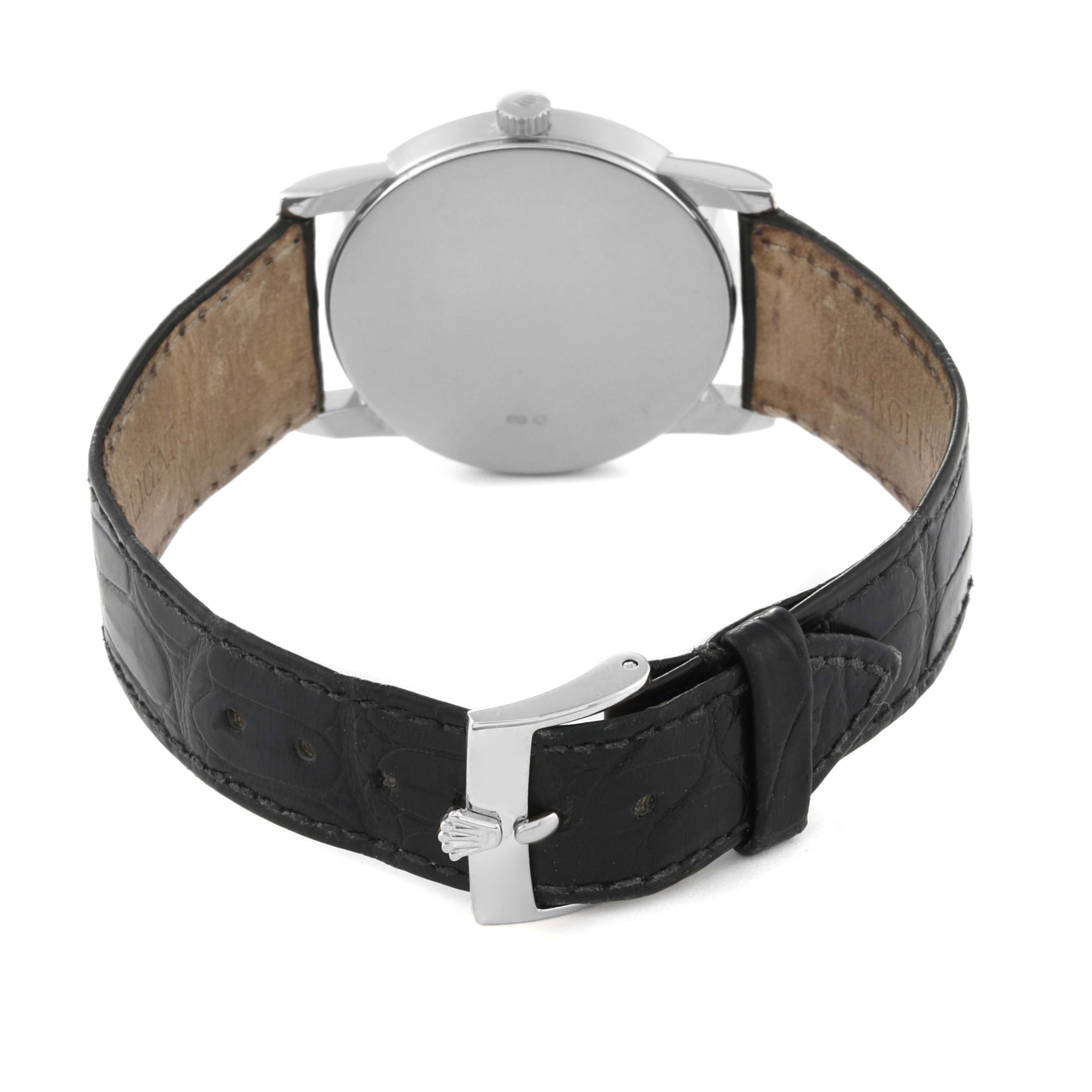 The image displays the back view of a Rolex Cellini 5116/9 Men's White Gold Grey Dial 5116/9 Men's White Gold Grey Dial watch with its case, crown, and leather strap visible.