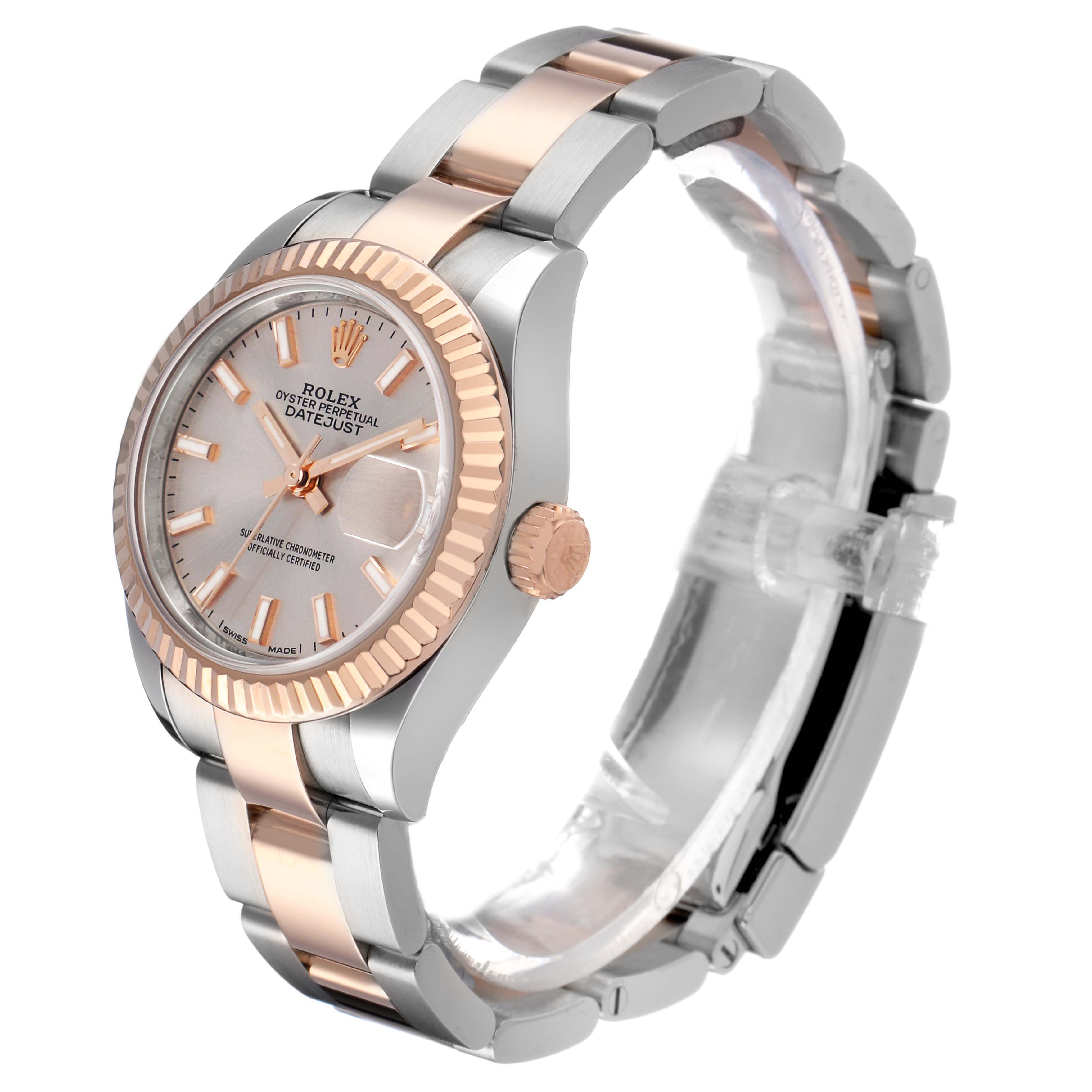 The Rolex Datejust 279171 Women's Steel and Gold (two tone) Pink Dial watch is shown at an angle displaying its face, crown, and two-tone bracelet.