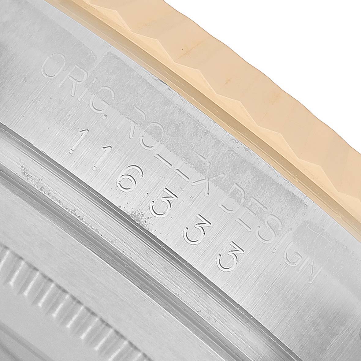 This image shows a close-up of the bezel's edge and engraved markings on the Datejust 41 by Rolex.