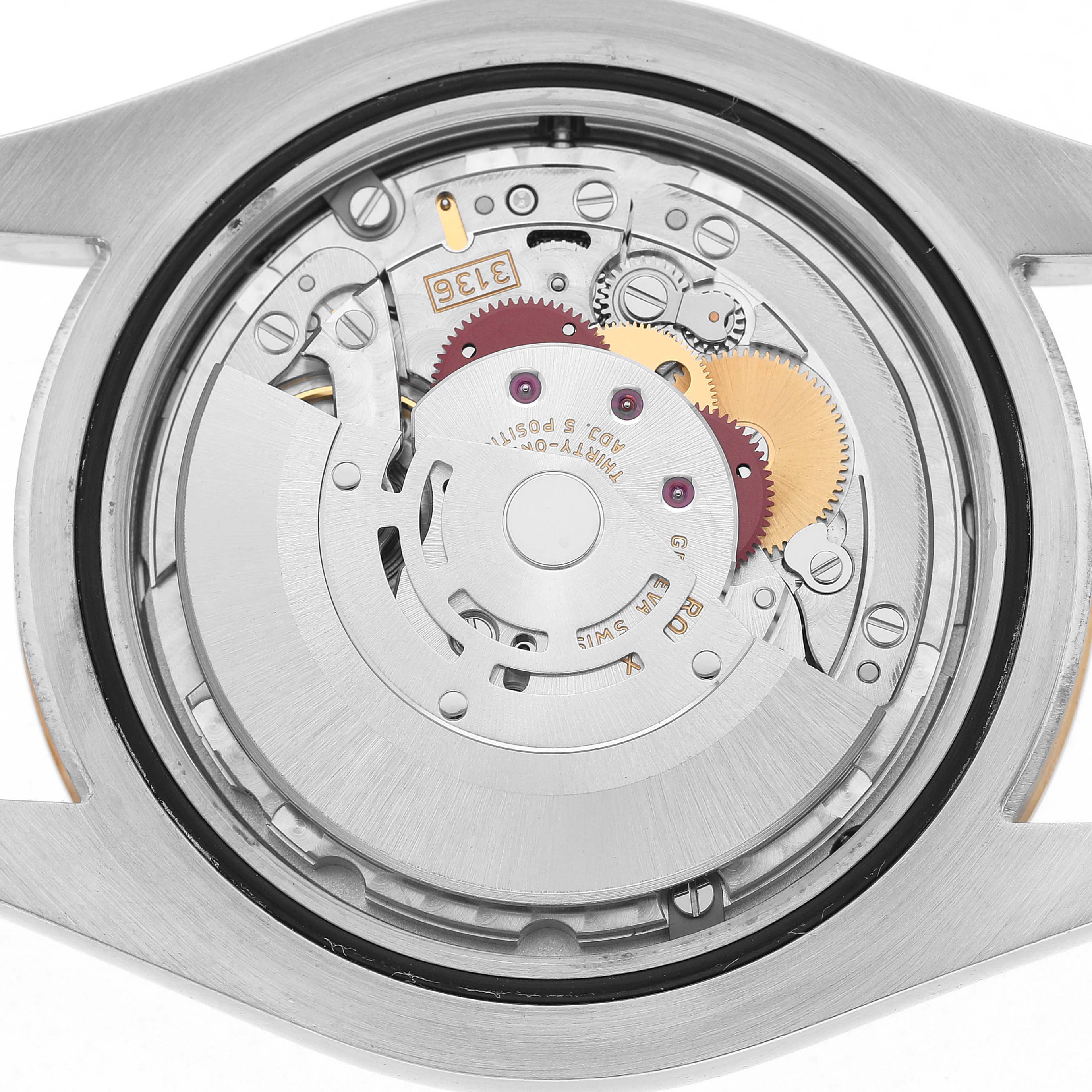 The image shows the back view of a Rolex Datejust 41 116333 Men's Steel and Gold (two tone) Champagne Dial, displaying its movement and rotor mechanism.