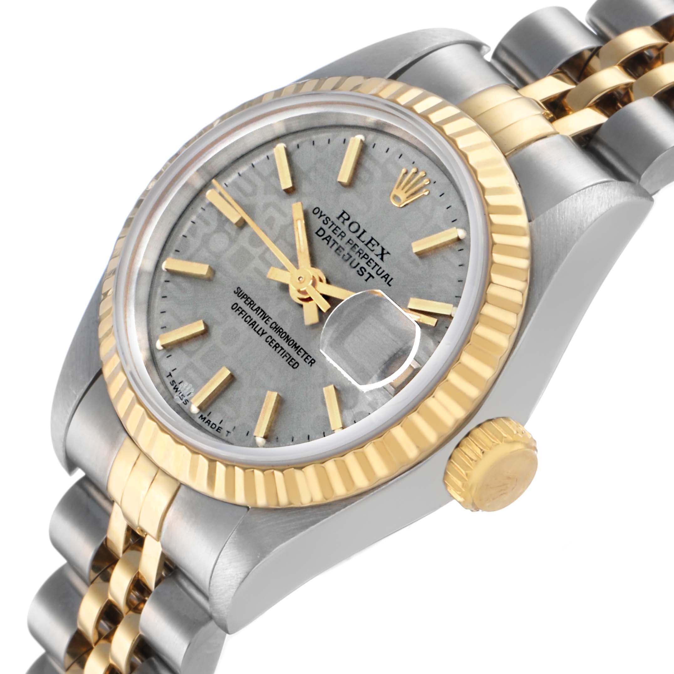 The Rolex Datejust 69173 Women's Steel and Gold (two tone) Silver Dial watch is shown from a side angle, highlighting the face, bezel, crown, and part of the bracelet.