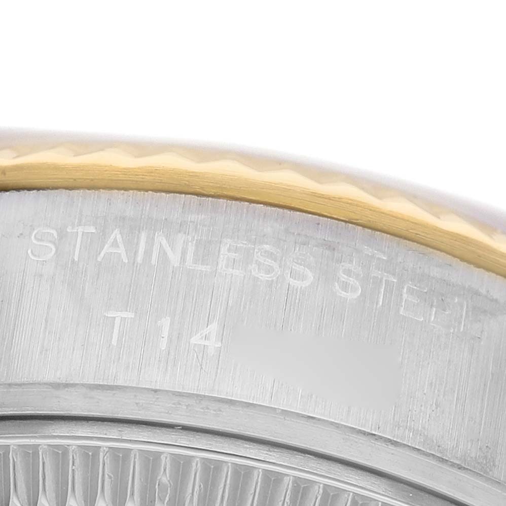 The image shows a close-up of the side of a Rolex Datejust 69173 Women's Steel and Gold (two tone) Silver Dial, highlighting the stainless steel case and gold bezel.