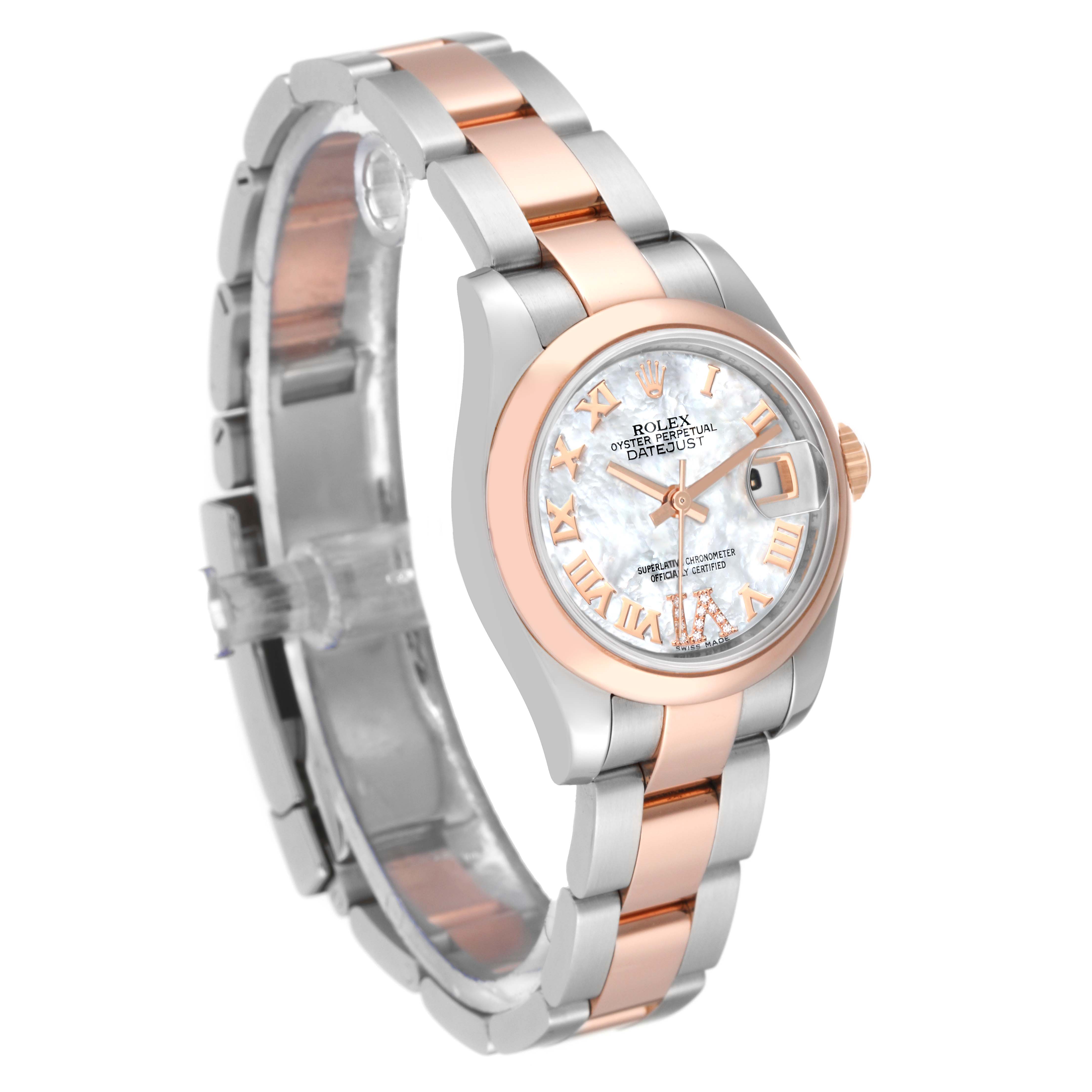 The image shows a side angle of the Rolex Datejust 179161 Women's Steel and Gold (two tone) Mother of Pearl Dial 179161 Women's Steel and Gold (two tone) Mother of Pearl Dial watch, highlighting its dial, two-tone bracelet, and case.