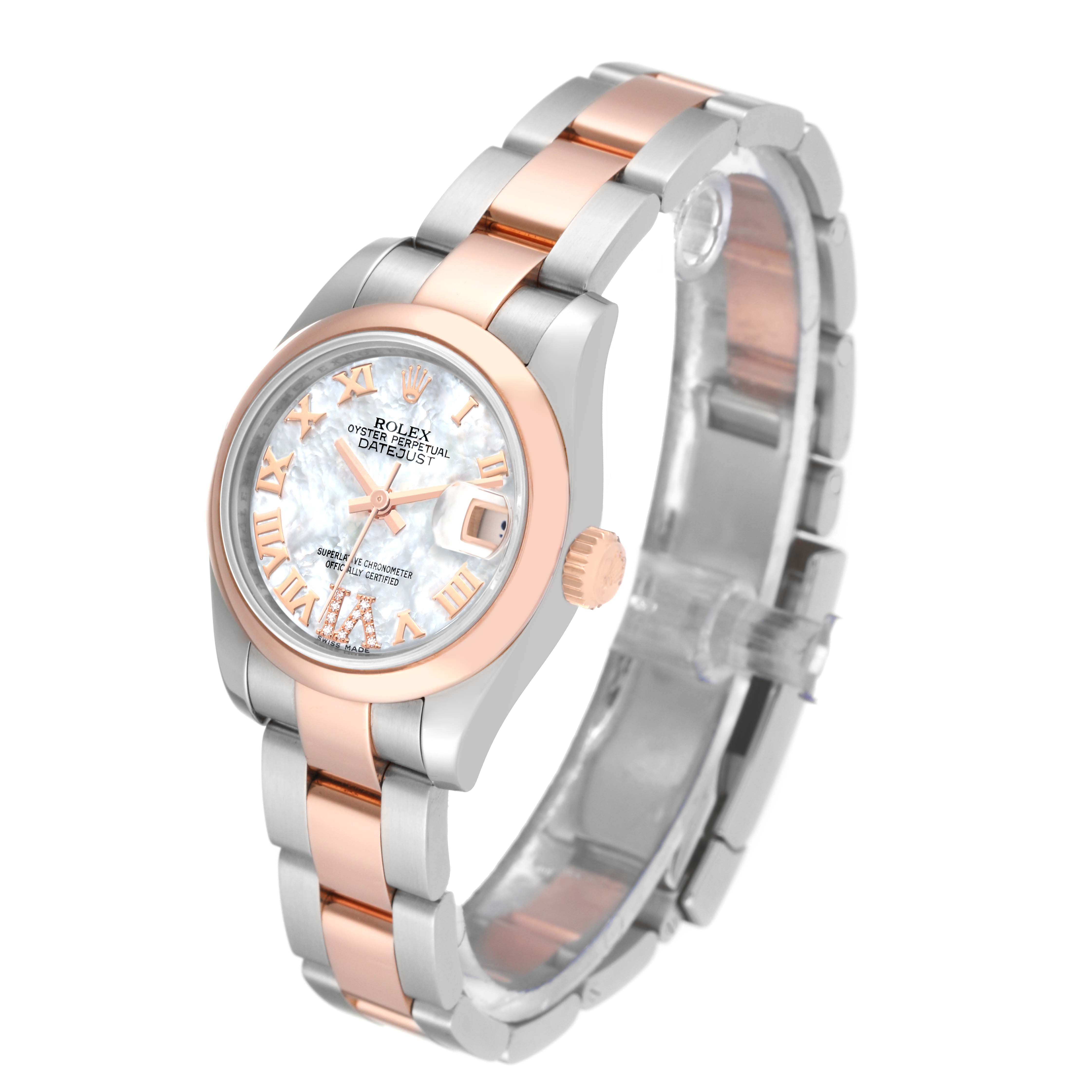 This is a Rolex Datejust 179161 Women's Steel and Gold (two tone) Mother of Pearl Dial 179161 Women's Steel and Gold (two tone) Mother of Pearl Dial watch shown from a 3/4 angle, highlighting the dial, bezel, and two-tone bracelet.