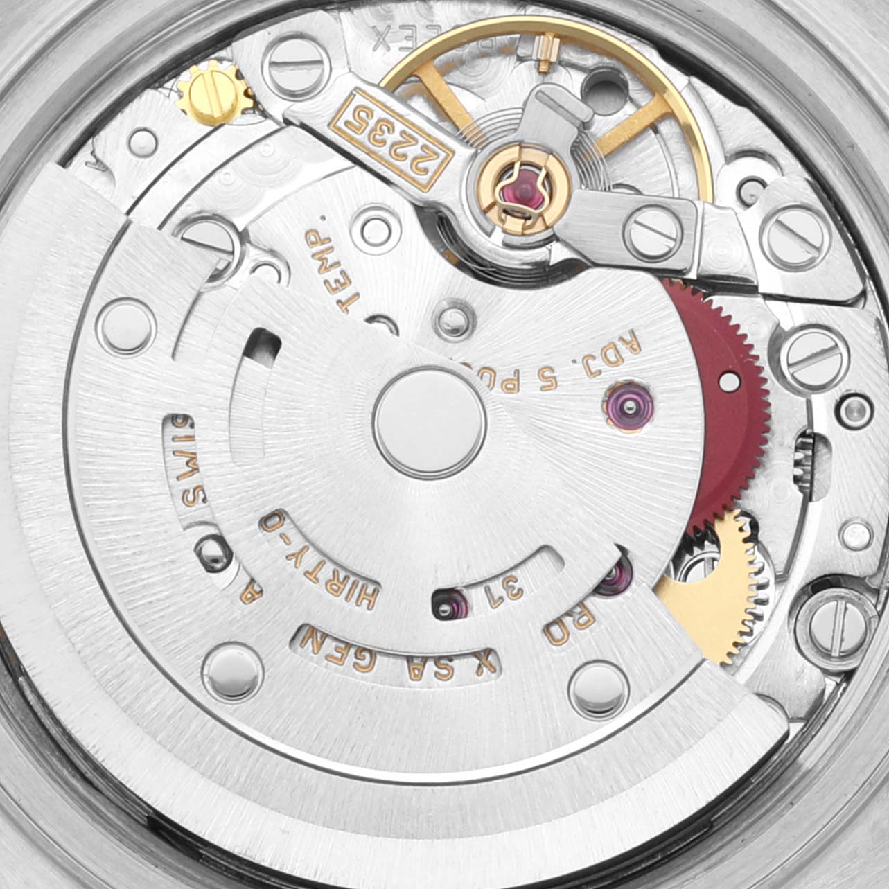 The image shows a close-up view of the movement inside a Rolex Datejust 79163 Women's Steel and Gold (two tone) Champagne Dial 79163 Women's Steel and Gold (two tone) Champagne Dial watch, highlighting the rotor and gears.