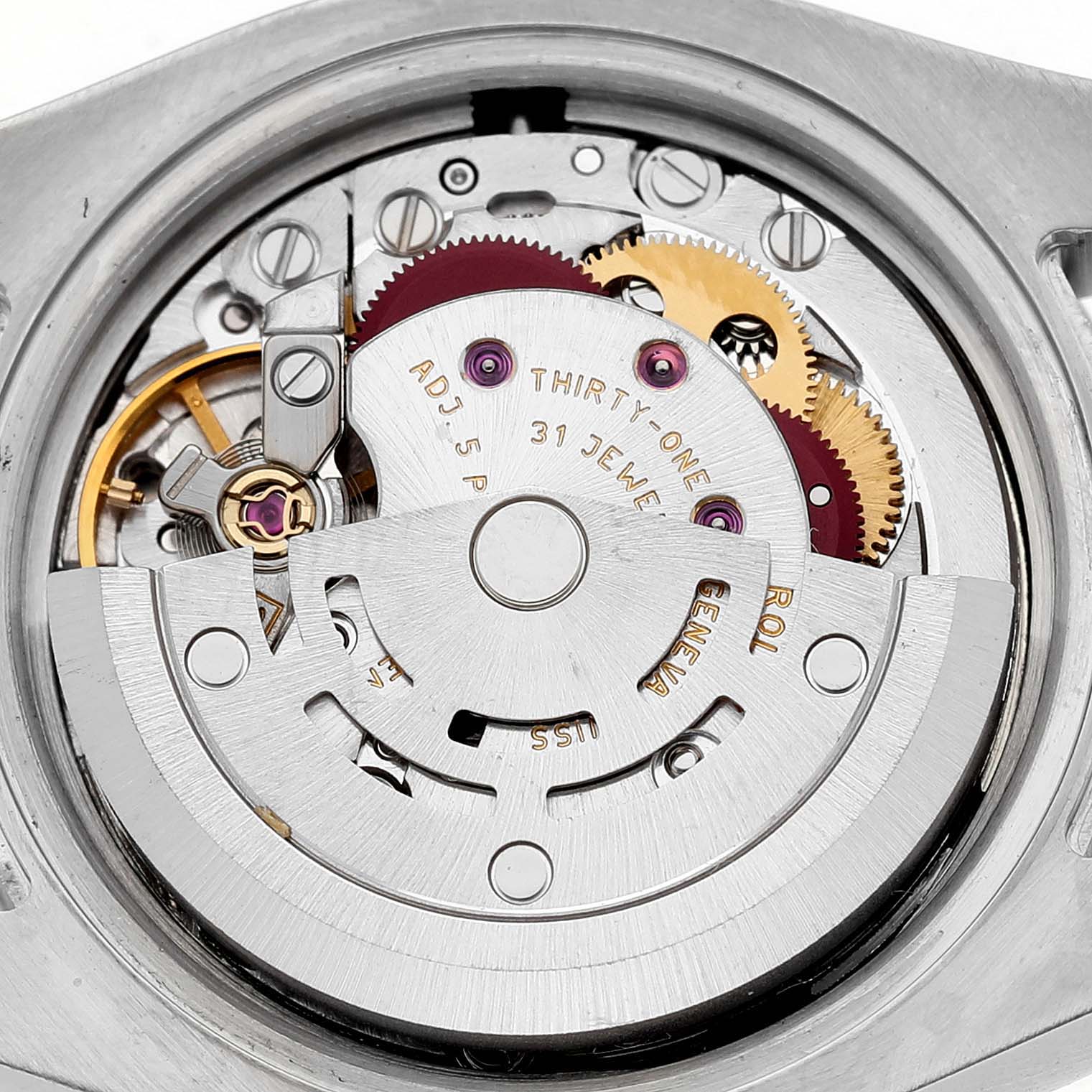 The image shows the movement of a Rolex Datejust 179313 Women's Steel and Gold (two tone) Mother of Pearl Dial watch viewed from the back, highlighting gears and jewels.