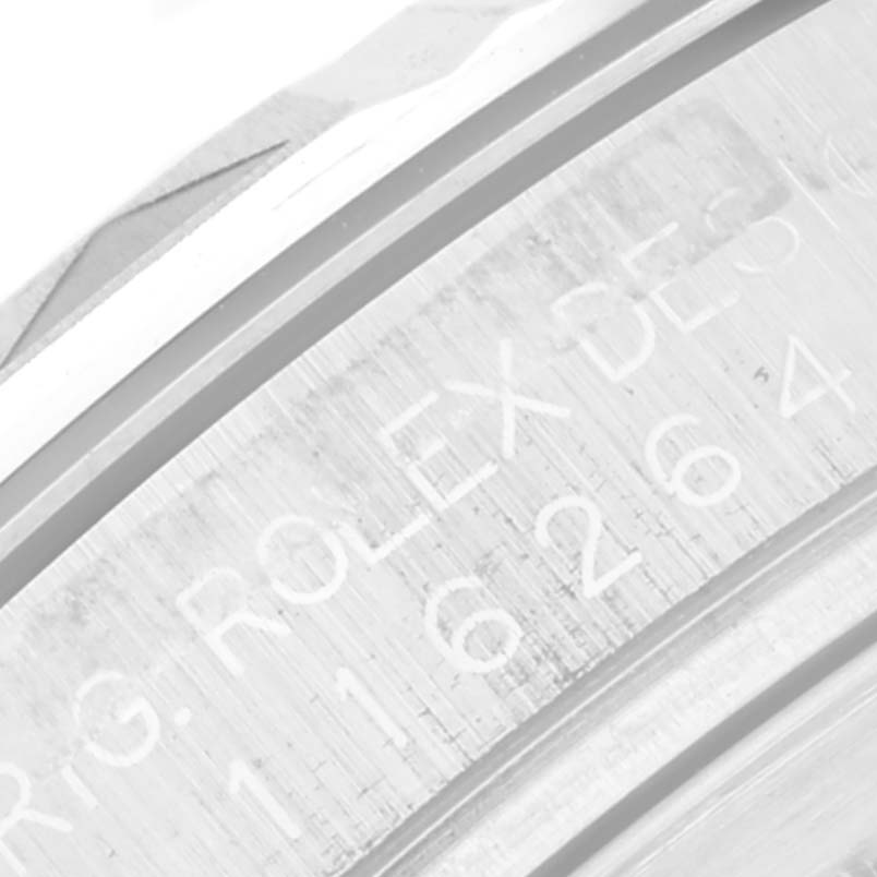 Close-up angle of the case side and engraved serial number on the bezel of a Rolex Turn-o-Graph 116264 Men's Stainless Steel Black Dial 116264 Men's Stainless Steel Black Dial watch.
