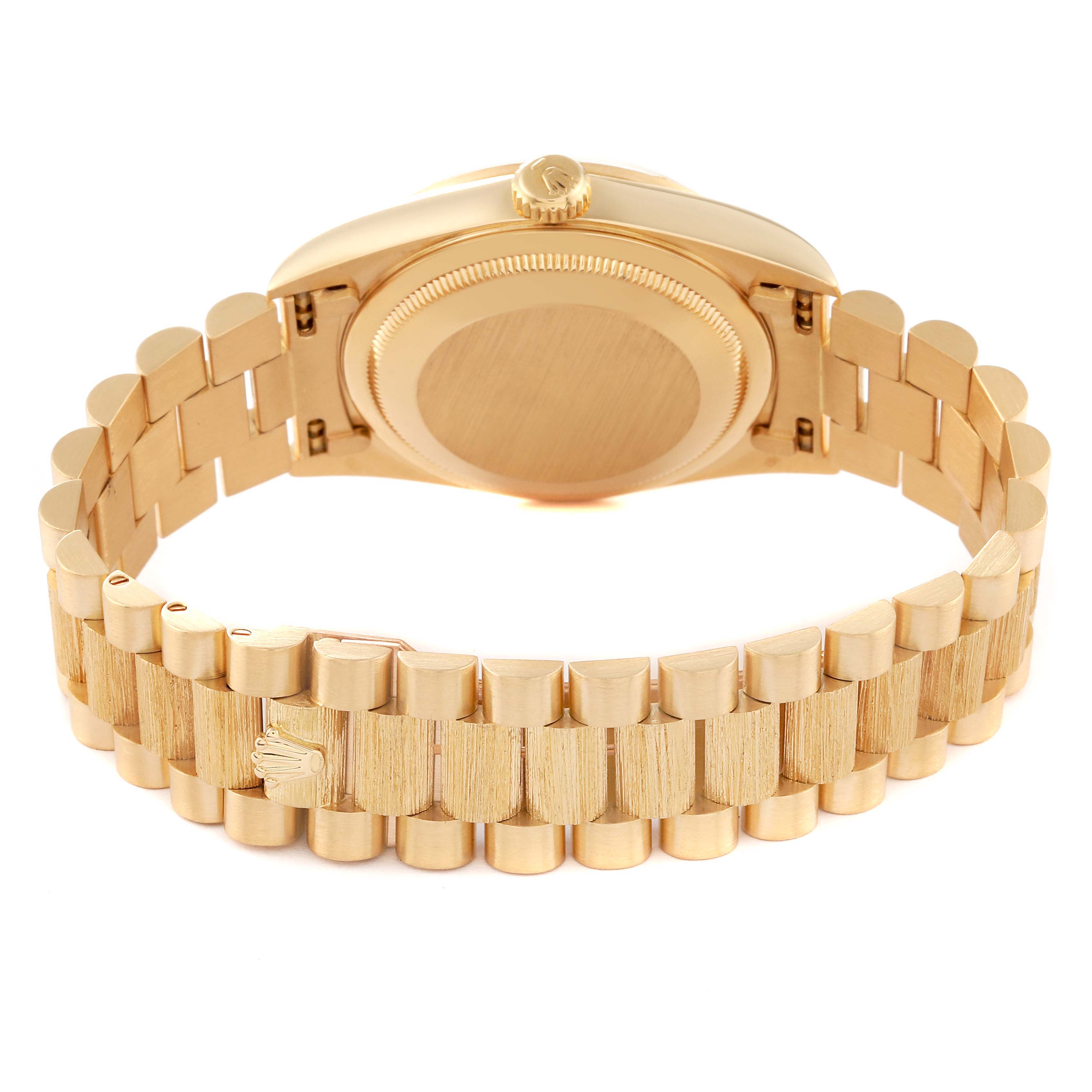 This image shows the back case and bracelet of a Rolex President 18248 Men
s Yellow Gold Champagne Dial 18248 Men
s Yellow Gold Champagne Dial model watch.