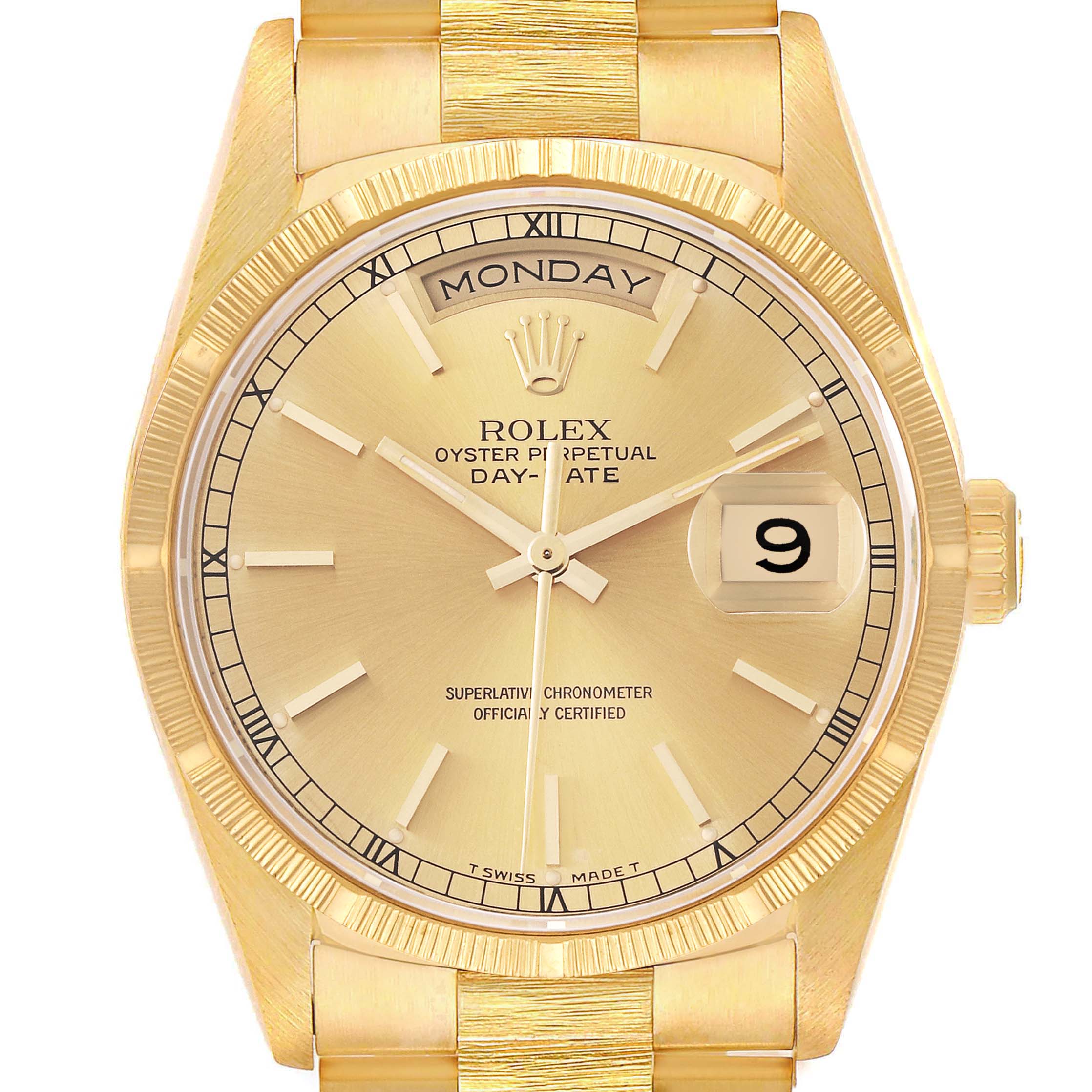 This image shows a close-up of the Rolex President 18248 Men
s Yellow Gold Champagne Dial 18248 Men
s Yellow Gold Champagne Dial model watch face, including the day and date displays and part of the bracelet.