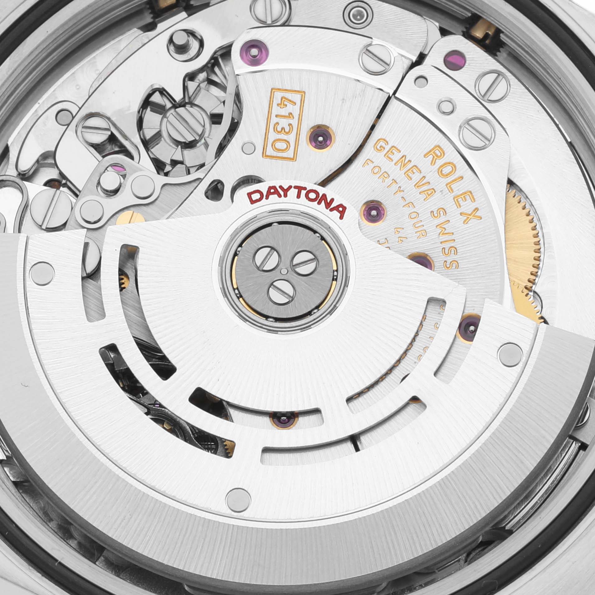 The image shows the inner mechanism and movement of a Rolex Daytona 116523 Men's Steel and Gold (two tone) Mother of Pearl Dial 116523 Men's Steel and Gold (two tone) Mother of Pearl Dial watch, highlighting the rotor and engraved text.