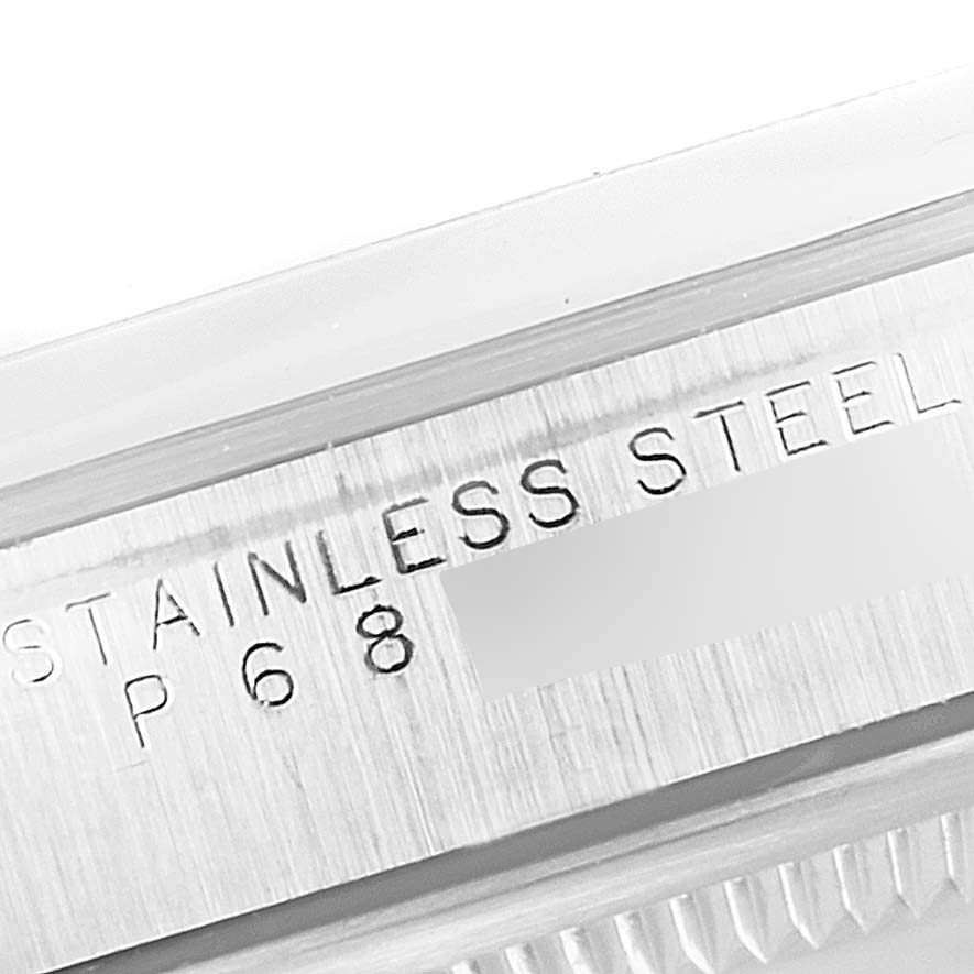 The image shows a close-up of the stainless steel casing with inscribed details of the Rolex Explorer 14270 Men's Stainless Steel Black Dial 14270 Men's Stainless Steel Black Dial model.