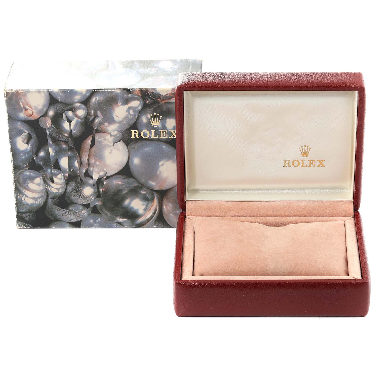 This image shows an open Rolex Mid-Size 77080 Women
s Stainless Steel Blue Dial 77080 Women
s Stainless Steel Blue Dial watch box and its outer packaging with the Rolex logo visible inside the box.