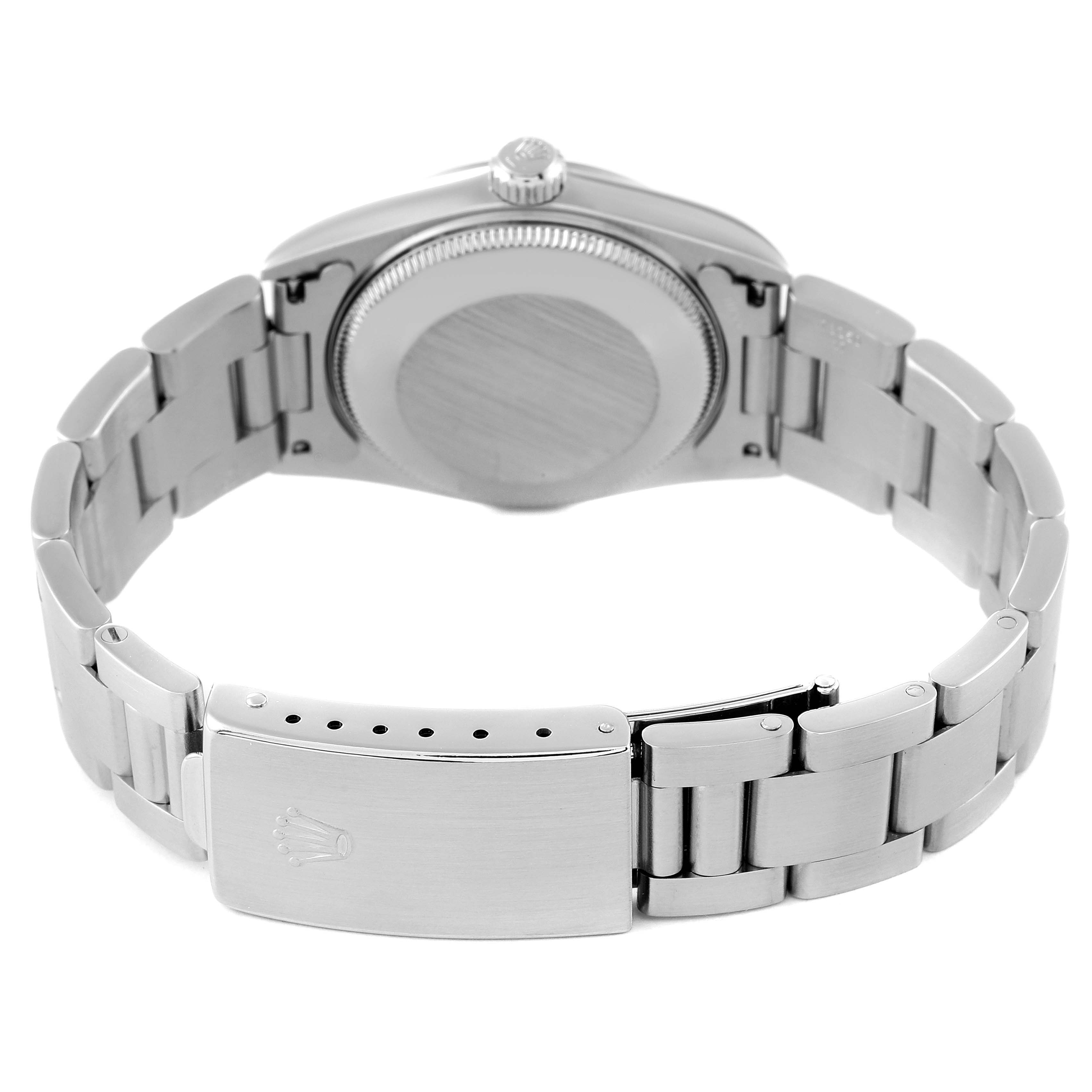 This image shows the back view of the Rolex Mid-Size 77080 Women
s Stainless Steel Blue Dial 77080 Women
s Stainless Steel Blue Dial model watch, highlighting the bracelet and clasp.