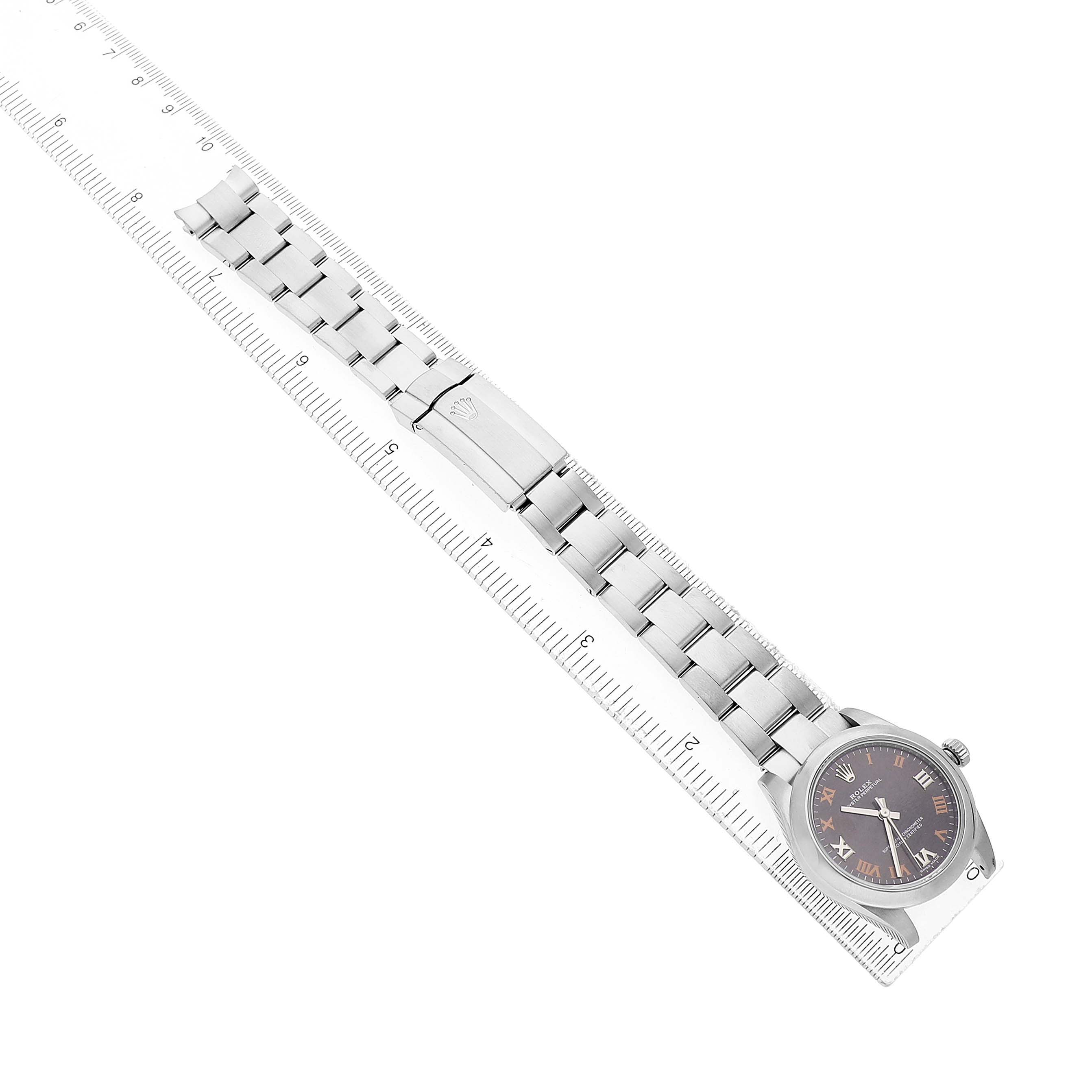 The Rolex Oyster Perpetual 177200 Women's Stainless Steel Grey Dial watch is shown at a diagonal angle, featuring its full metal bracelet and clasp.