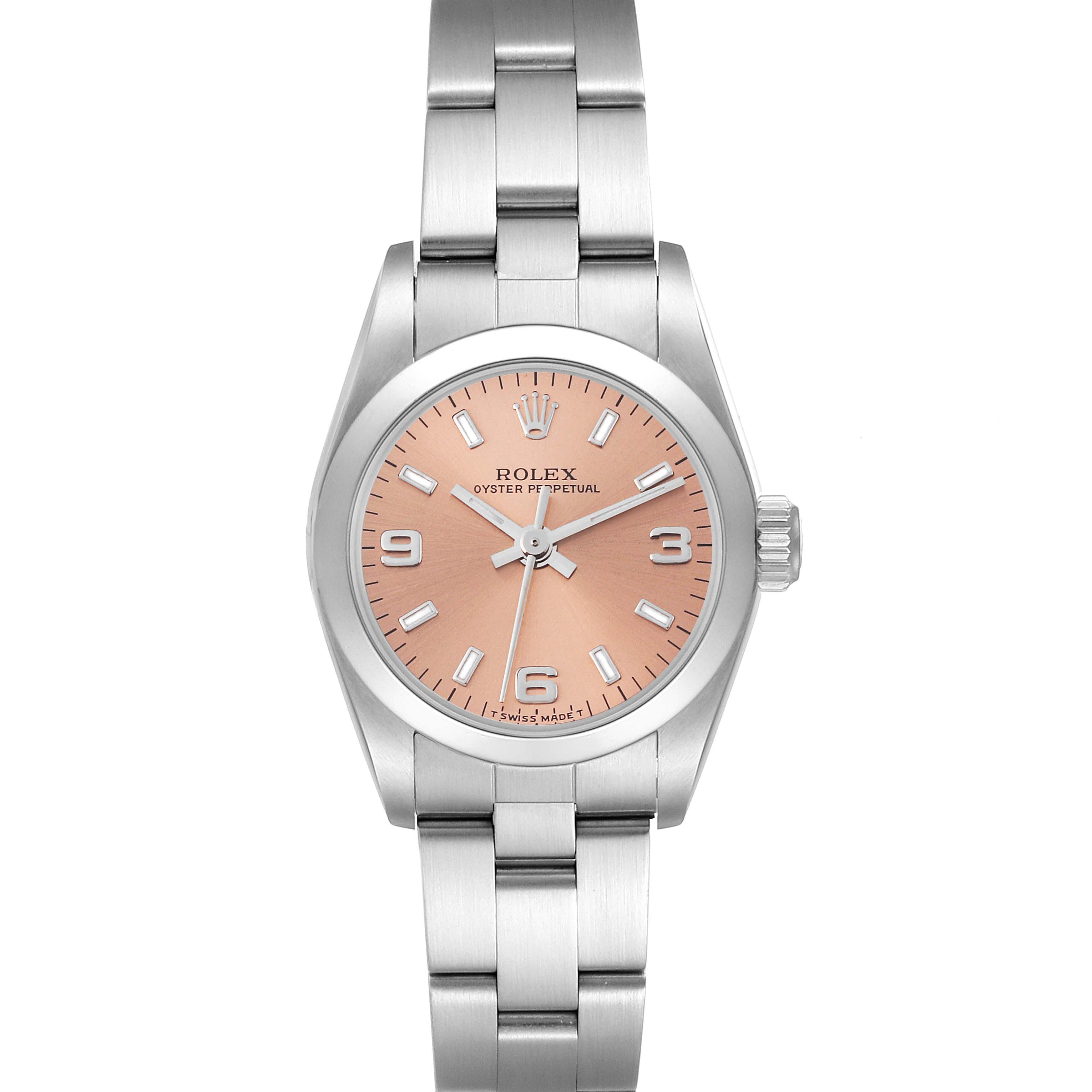 The Rolex Oyster Perpetual 67180 Women's Stainless Steel Pink Dial 67180 Women's Stainless Steel Pink Dial watch is shown from the front, highlighting its pink dial, bezel, and stainless steel bracelet.