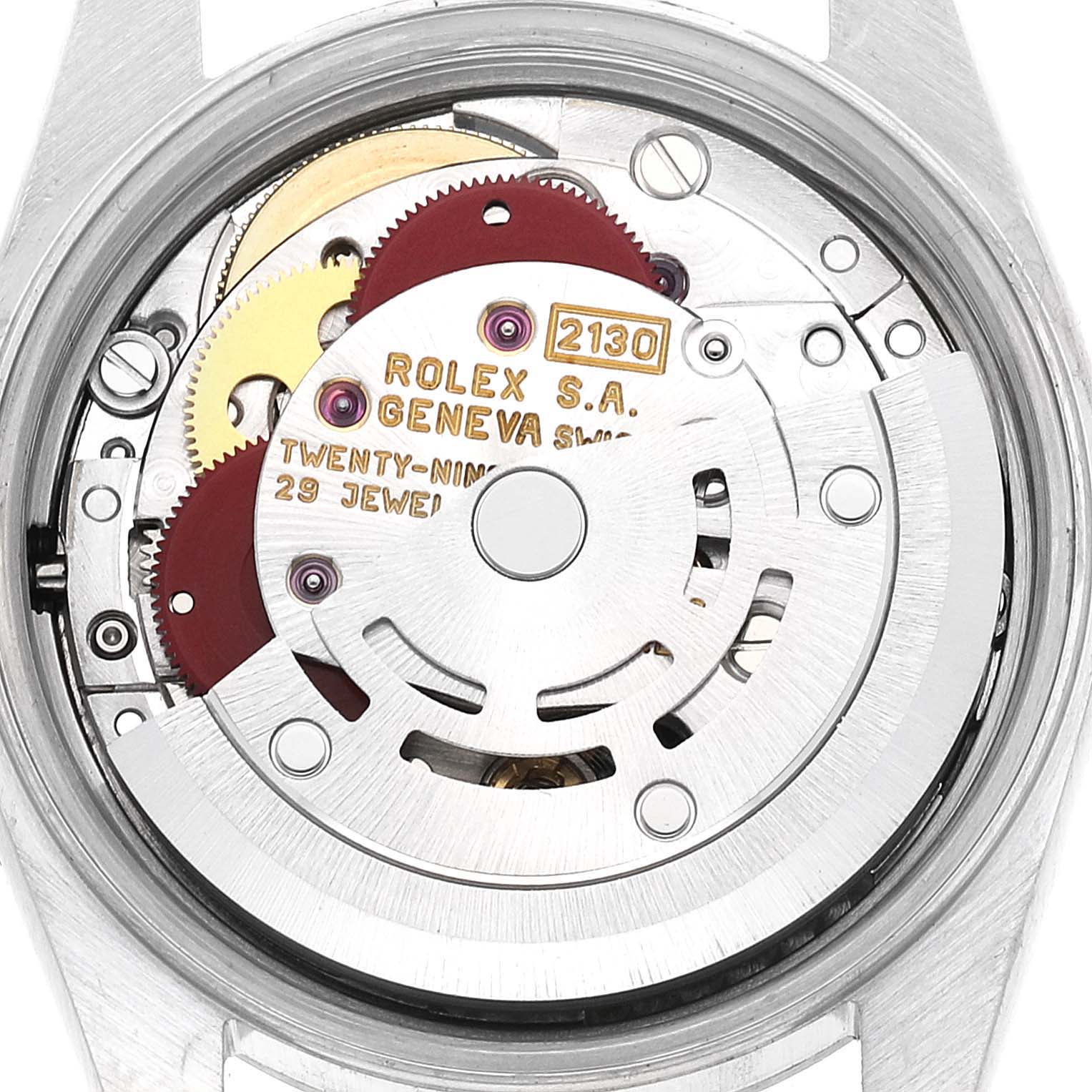 The image shows a close-up view of the movement mechanism of a Rolex Oyster Perpetual 67180 Women's Stainless Steel Pink Dial 67180 Women's Stainless Steel Pink Dial watch.