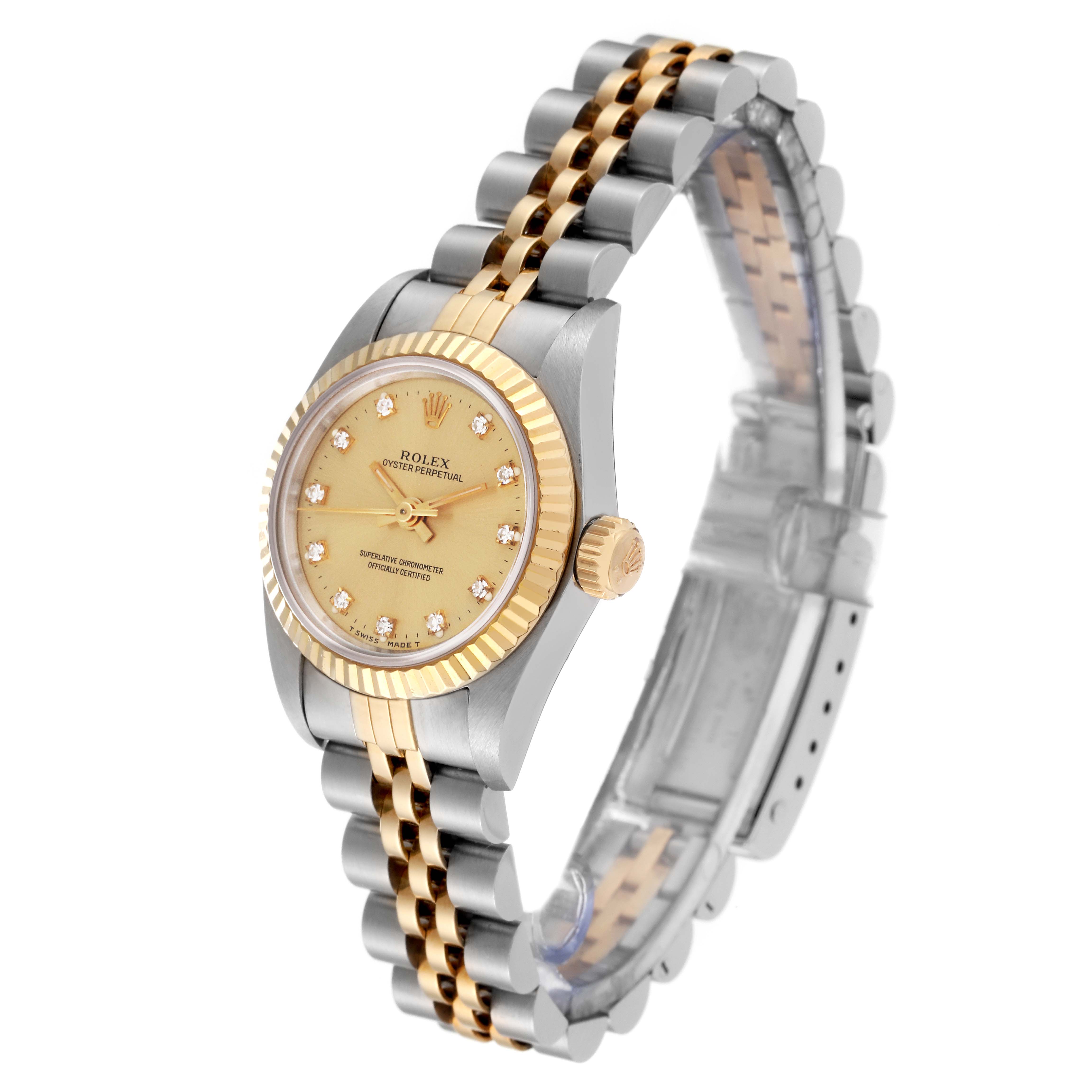 The image shows a Rolex Oyster Perpetual M67193 Women's Steel and Gold (two tone) Champagne Dial M67193 Women's Steel and Gold (two tone) Champagne Dial watch at a three-quarter angle, highlighting its face, bezel, and bracelet.