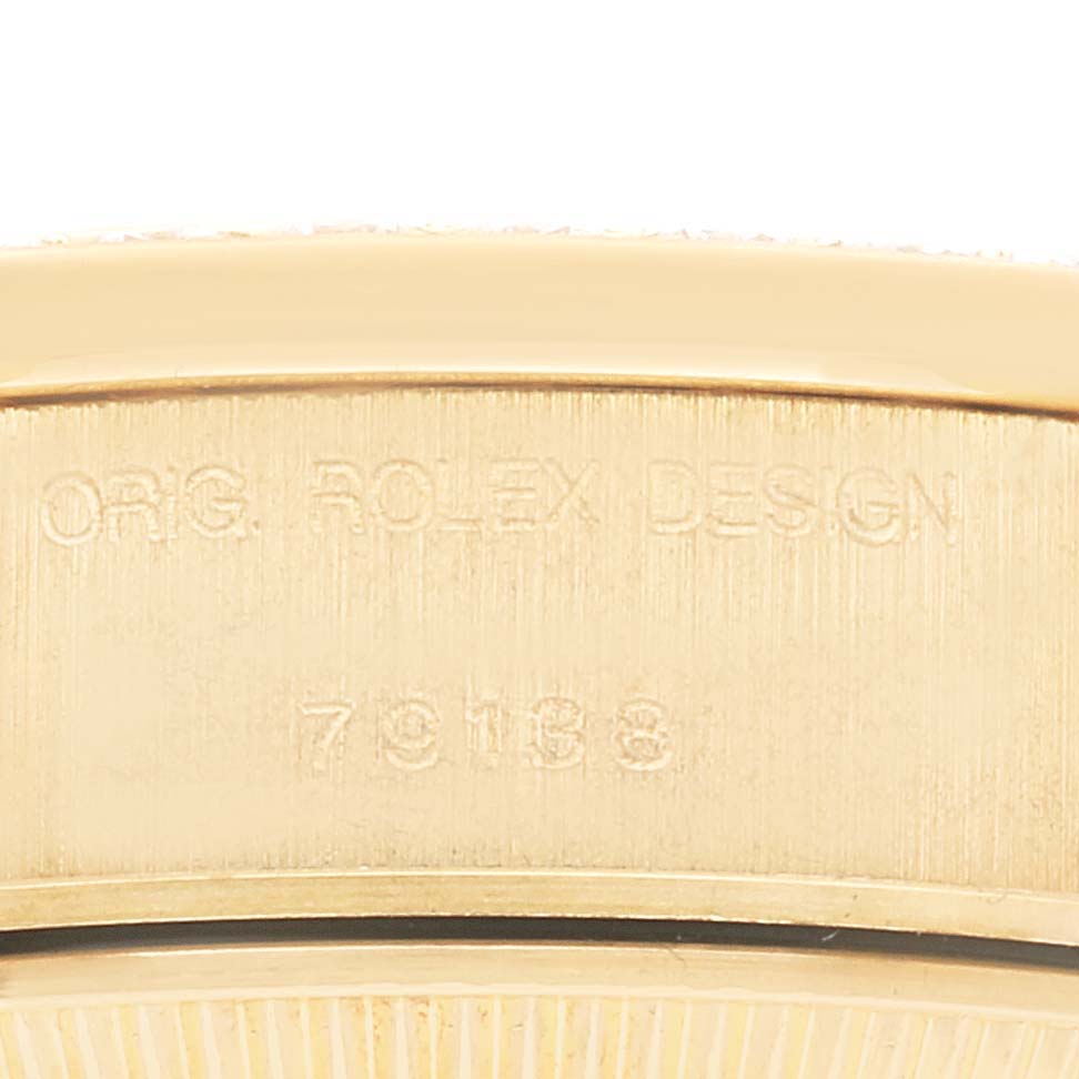 Close-up view of the case back
s edge and serial engraving on a Rolex President 79138G Women
s Yellow Gold Champagne Dial 79138G Women
s Yellow Gold Champagne Dial model.