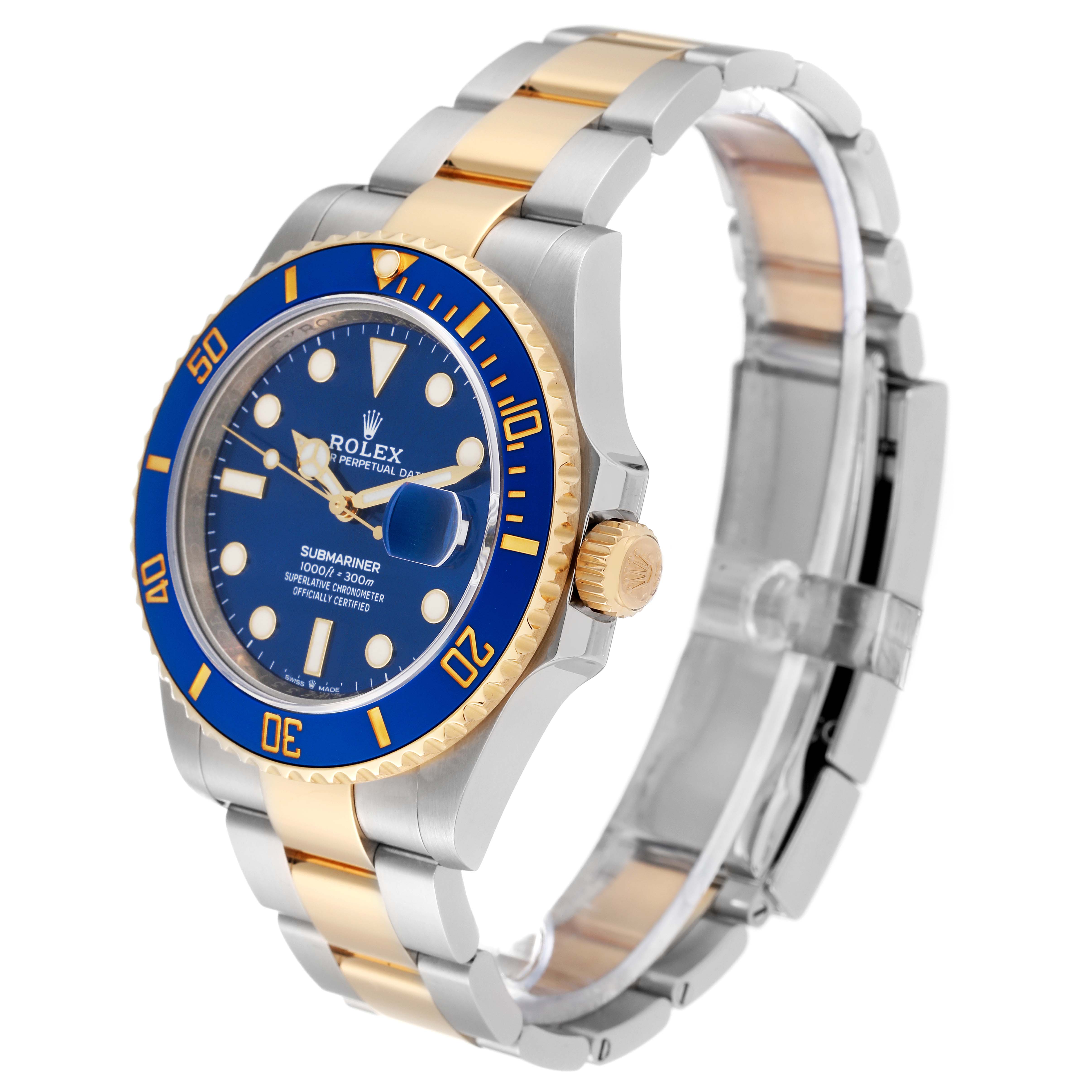 The image shows a side angle view of a Rolex Submariner 126613LB Men's Steel and Gold (two tone) Blue Dial 126613LB Men's Steel and Gold (two tone) Blue Dial watch, highlighting the blue dial, gold accents, and two-tone bracelet.