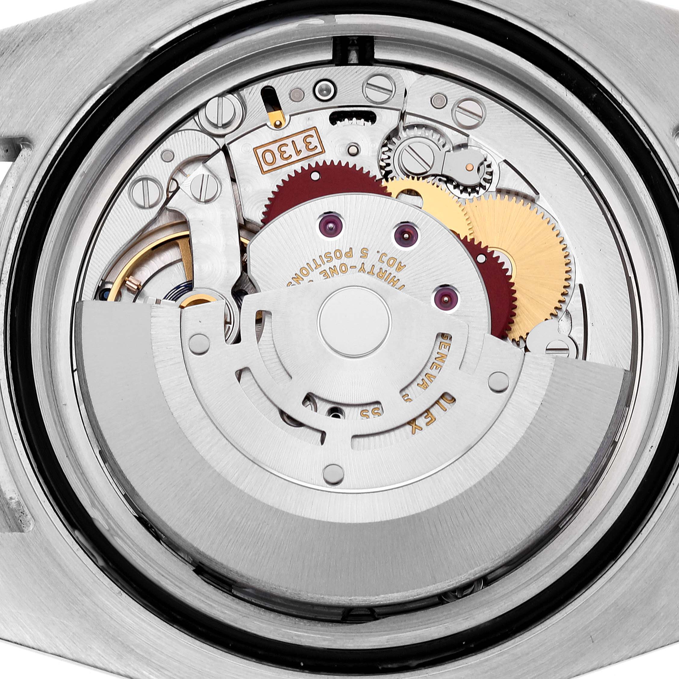 The image shows a close-up of the internal movement of a Rolex Submariner 114060 Men's Stainless Steel Black Dial 114060 Men's Stainless Steel Black Dial watch, highlighting its mechanical components and gears.