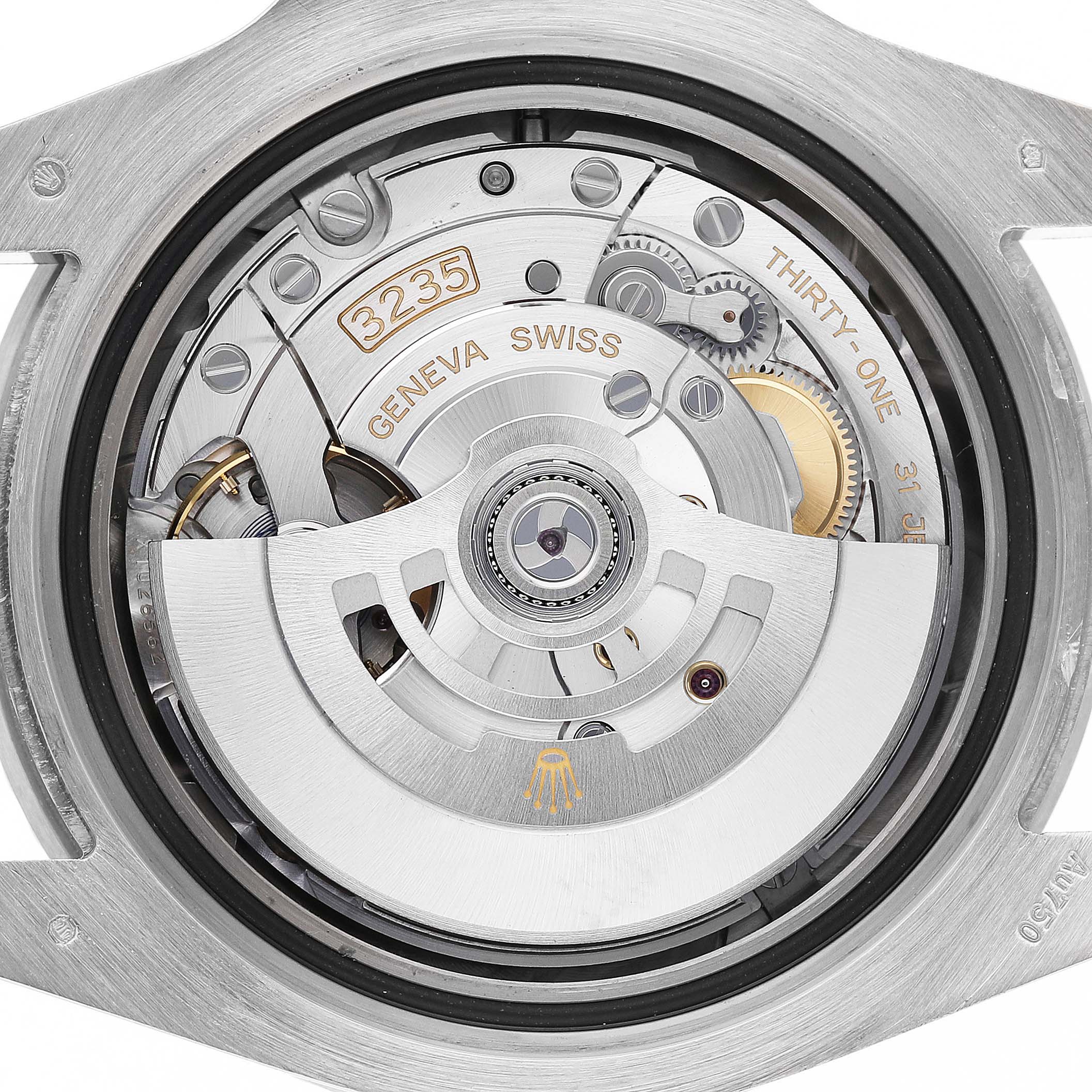 The image shows the back of a Rolex Submariner 126619 Men's White Gold Black Dial, highlighting the intricate movement and rotor.