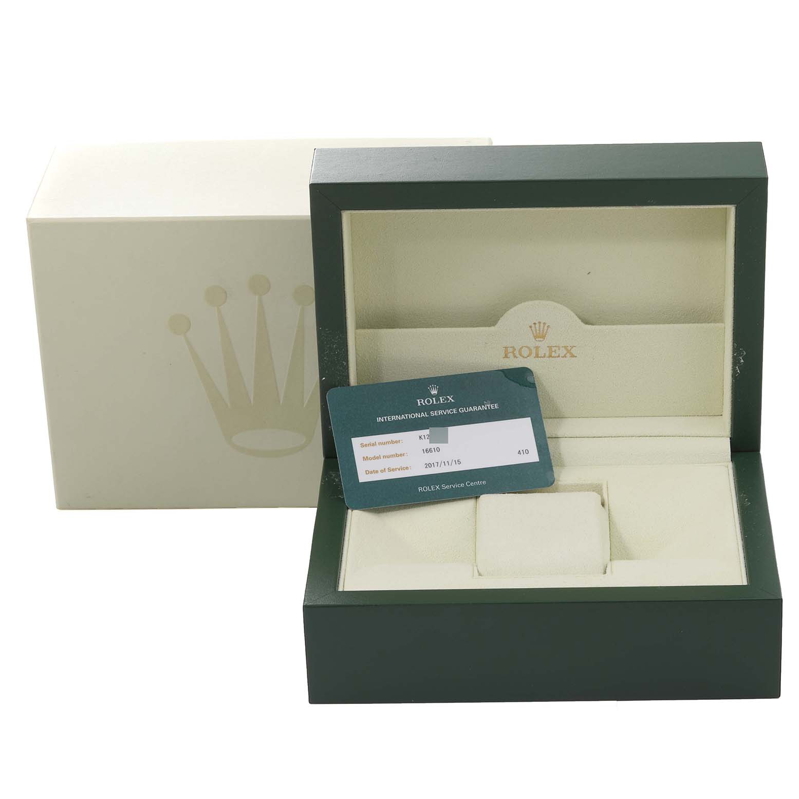 The image shows the packaging box and guarantee card for a Rolex Submariner 16610 Men
s Stainless Steel Black Dial 16610 Men
s Stainless Steel Black Dial watch.
