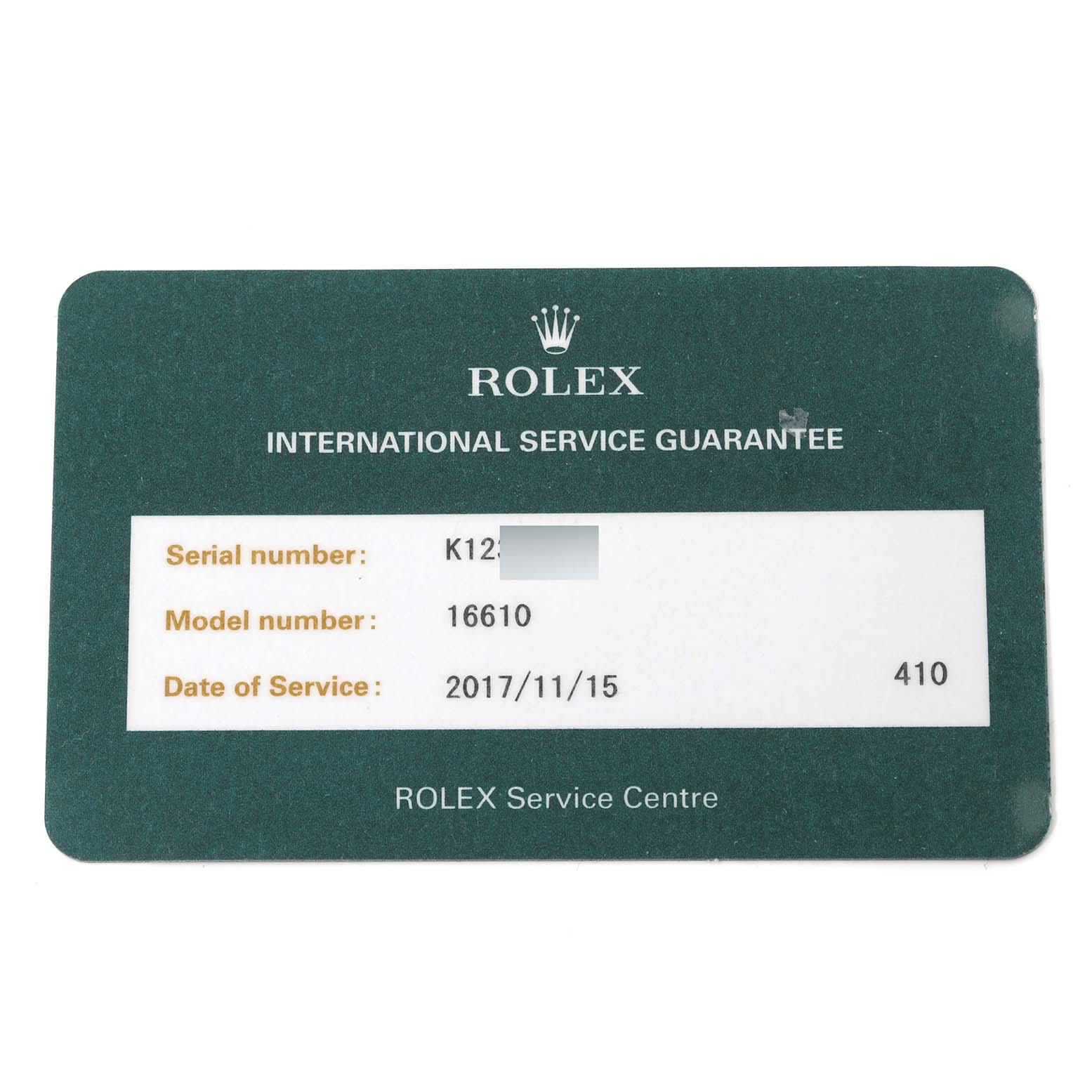 The image shows a Rolex International Service Guarantee card for a Submariner model 16610, displaying the serial number and date of service.