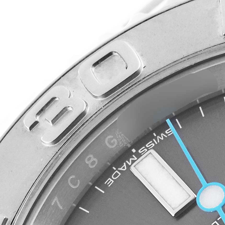 Close-up of the Rolex Yacht-Master 116622 Men
s Stainless Steel Grey Dial 116622 Men
s Stainless Steel Grey Dial watch showing the bezel with 
30
 marking and part of the watch face with 
Swiss Made
.