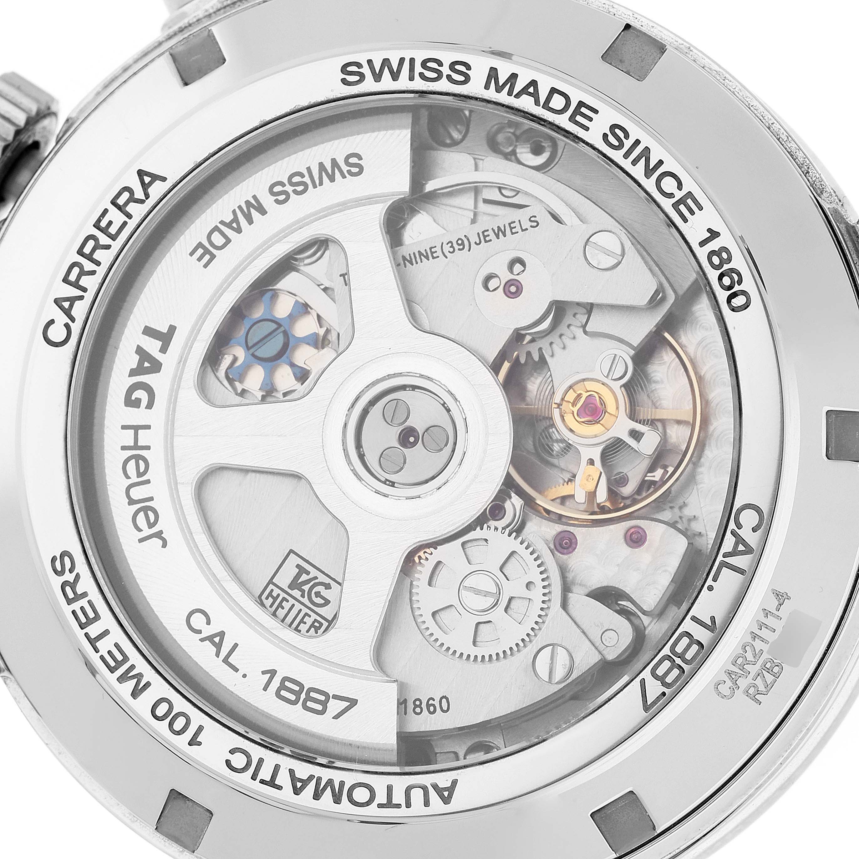 The image shows the back of the Tag Heuer Carrera CAR2111 Men's Stainless Steel Silver Dial CAR2111 Men's Stainless Steel Silver Dial watch, highlighting its mechanical movement and engraved details.