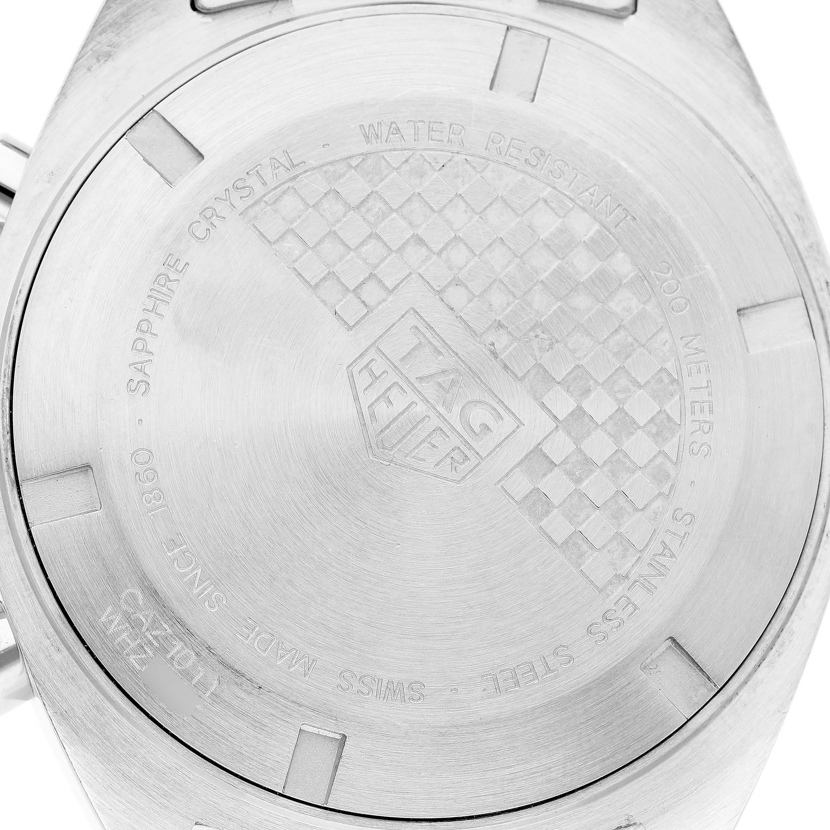 The image shows the back case of a Tag Heuer Formula 1 CAZ1011.BA0843 Men's Stainless Steel Black Dial watch, displaying etched branding and specifications.