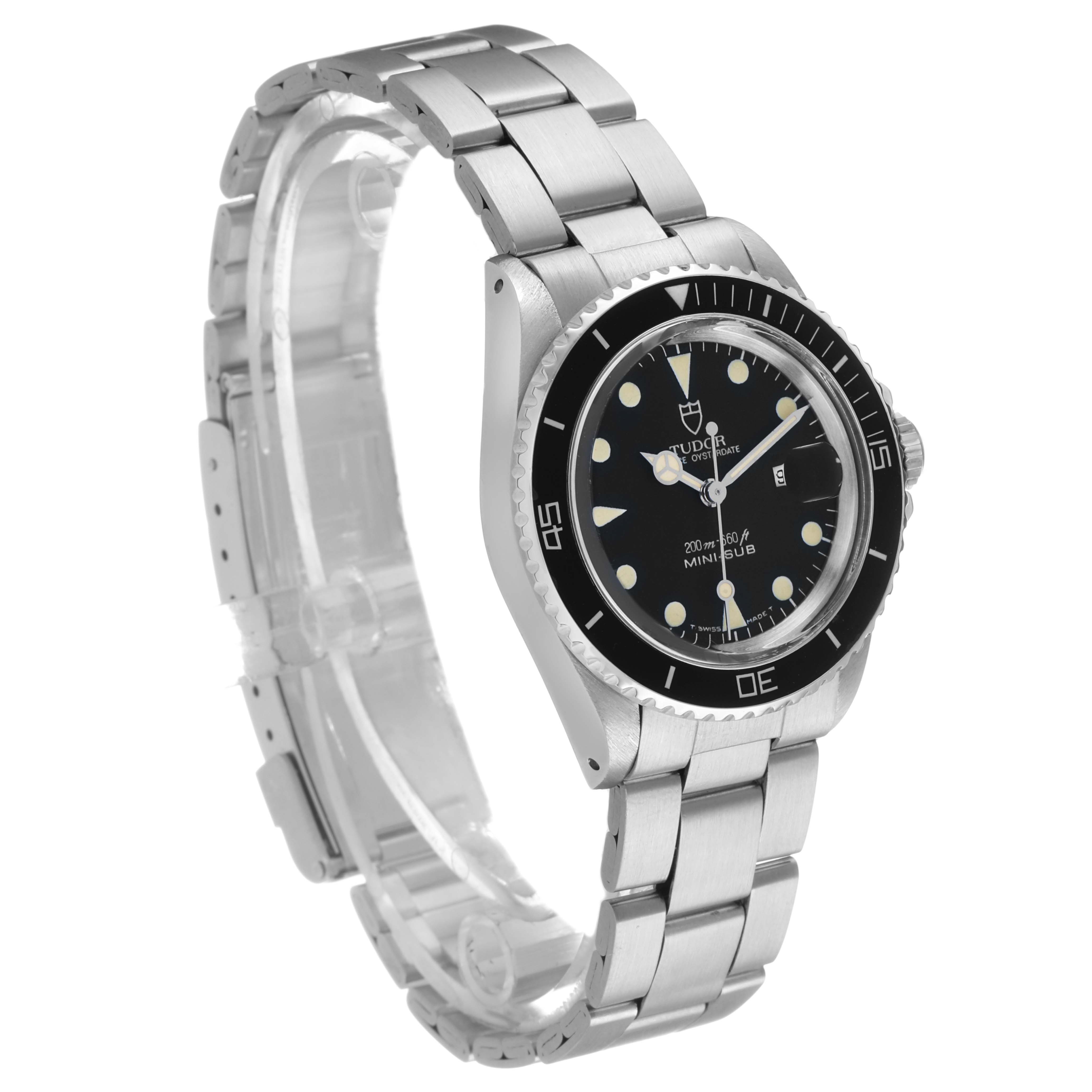 The Tudor Prince 73090 Men's Stainless Steel Black Dial watch is shown at a three-quarter angle, displaying the dial, bezel, and bracelet.