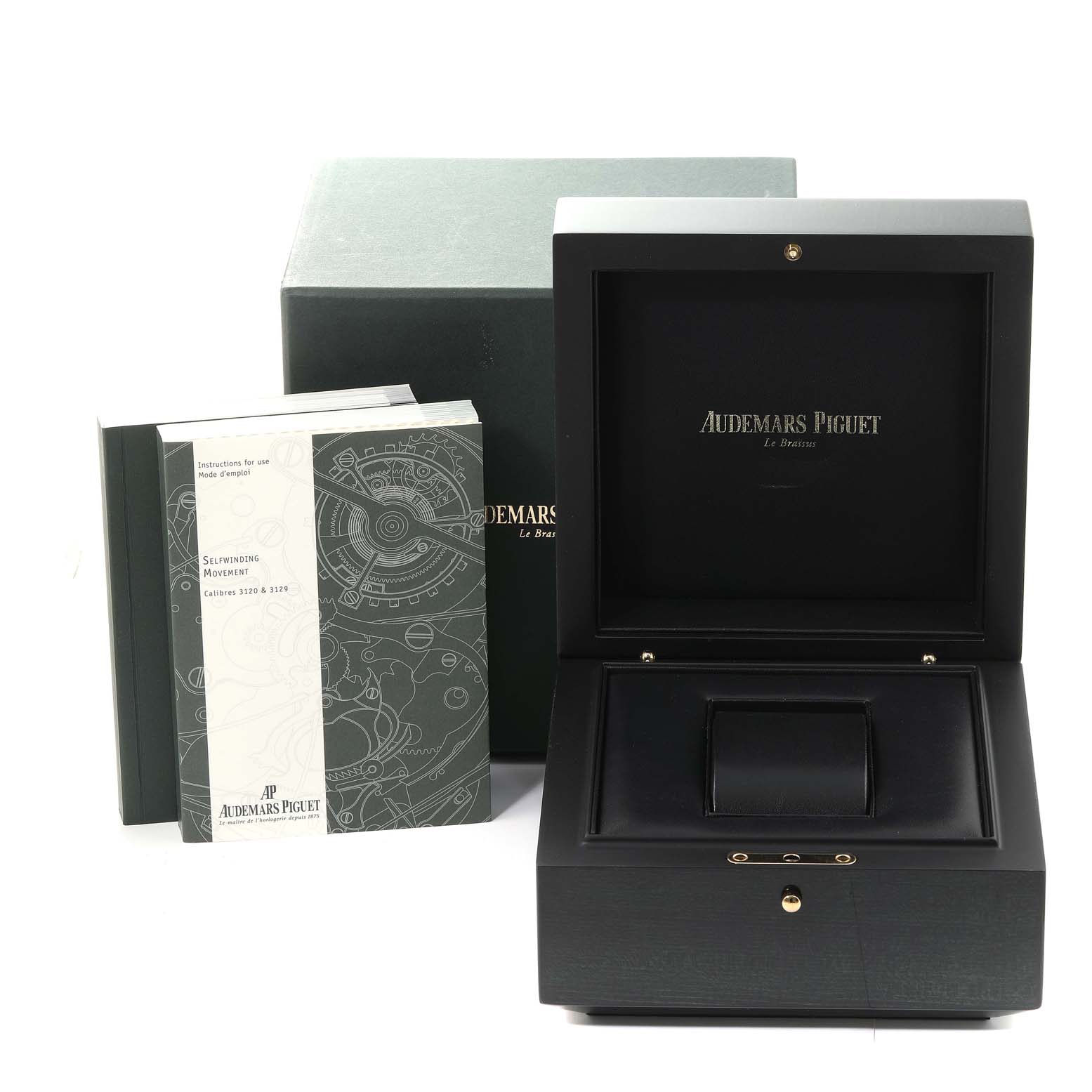 This image shows Audemars Piguet Royal Oak 15300OR.OO.D002CR.01 Men's Rose Gold Black Dial 15300OR.OO.D002CR.01 Men's Rose Gold Black Dial watch accessories including a box and manuals at a front angle.
