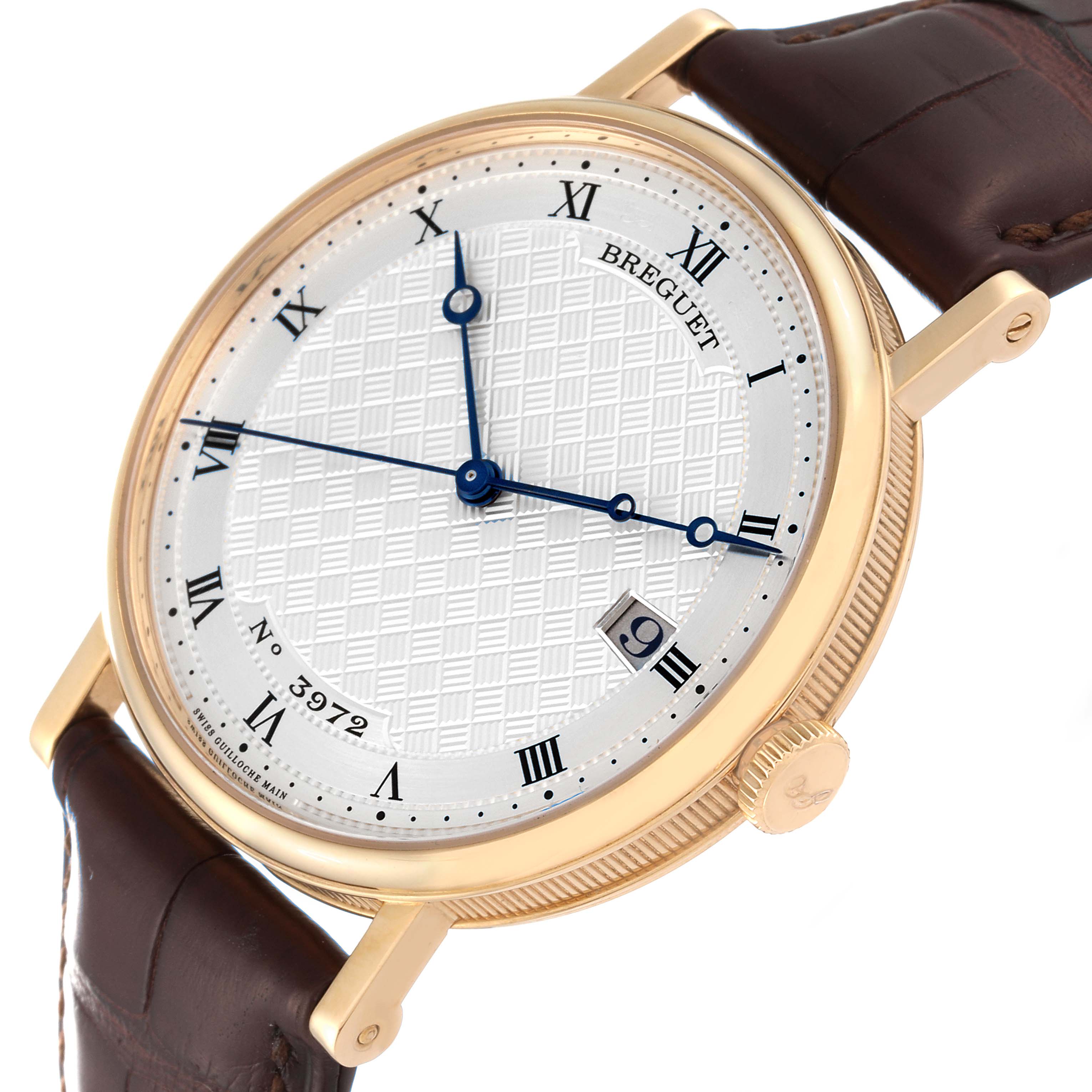 The image shows the Breguet Classique 5177BA/12/9V6 Men's Yellow Gold Silver Dial 5177BA/12/9V6 Men's Yellow Gold Silver Dial watch from an angled front view, highlighting the dial, roman numerals, blue hands, and the crown.