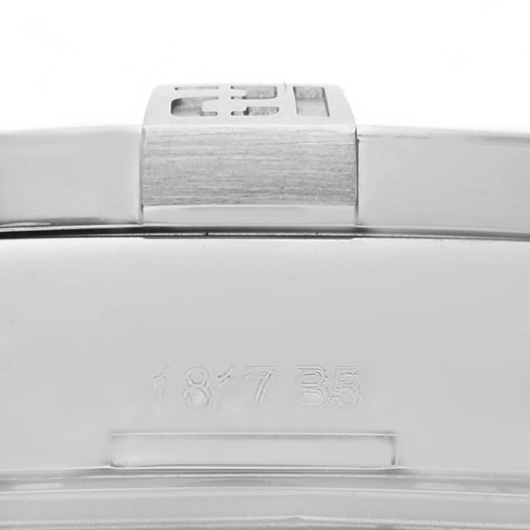 This image shows a close-up of the clasp on a Breitling Avenger A3239011/BC35 Men's Stainless Steel Black Dial A3239011/BC35 Men's Stainless Steel Black Dial watch, highlighting the brushed metal finish and engraved part number "187 B5".