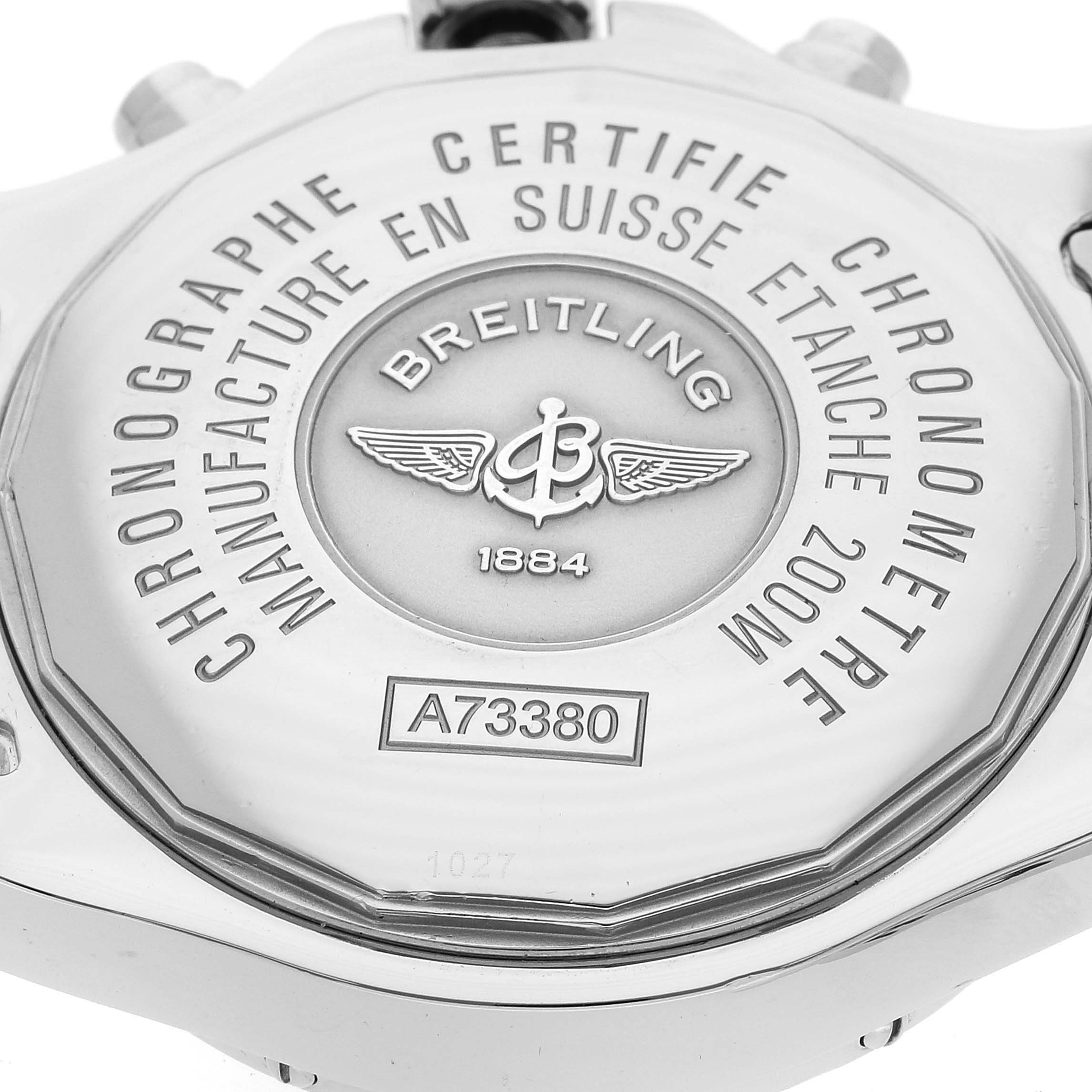 The image shows the back case of a Breitling Colt A73380 Men's Stainless Steel White Dial A73380 Men's Stainless Steel White Dial watch with its branding, certification details, and model number.